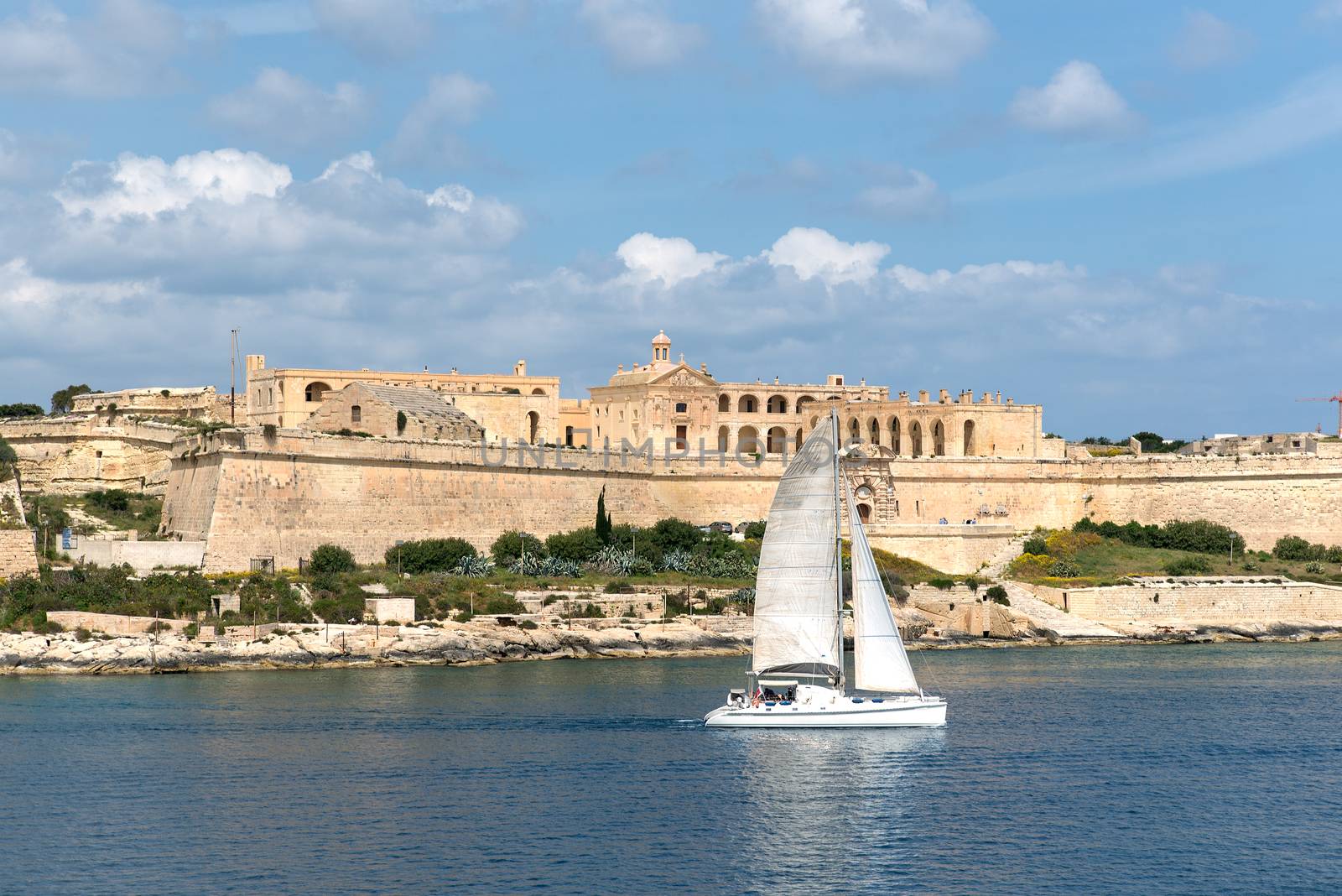 Sailboat on front of Valletta, the Capital City of Malta