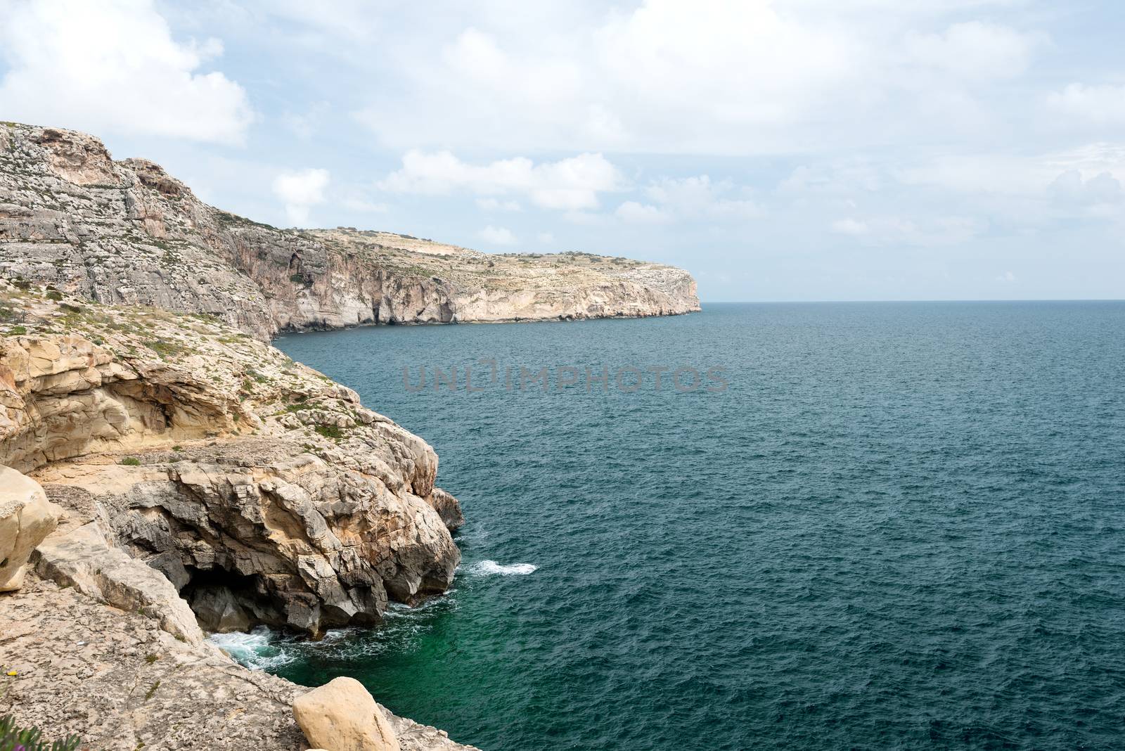 Caves and cliffs at the coast of Gozo Island, Malta
