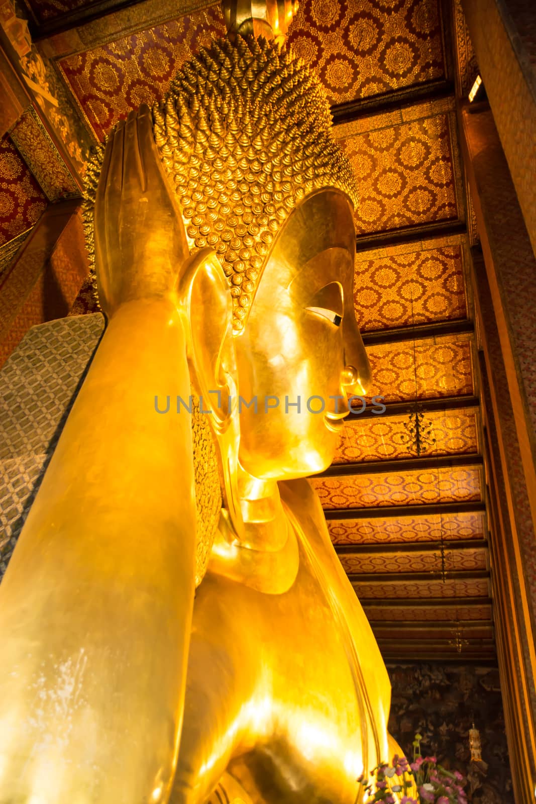 Reclining Buddha gold statue. Wat Pho, Bangkok, Thailand, travel in Asia