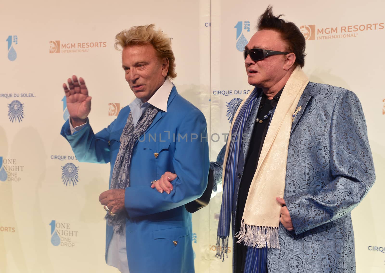 LAS VEGAS - MARCH 21: Former magicians Siegfried (L) and Roy arrives at Cirque du Soleil's annual 'One Night for One Drop' at the Mandalay Bay Resort and Casino on March 21, 2014 in Las Vegas, Nevada