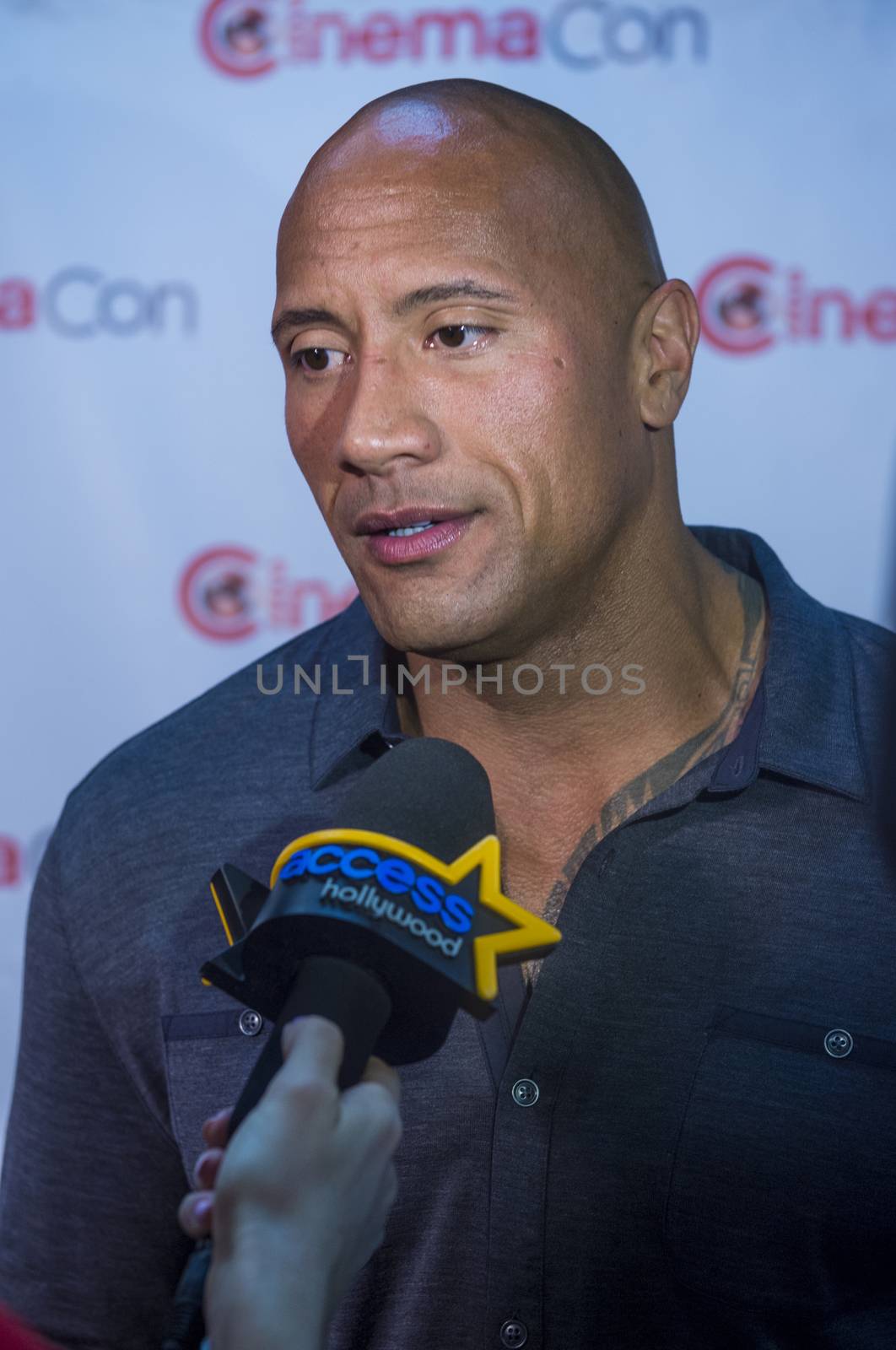 LAS VEGAS, NV - MARCH 24:  Dwayne Johnson (The Rock) arrives at the 2014 CinemaCon Paramount opening night presentation at Caesars Palace on March 24, 2014 in Las Vegas, Nevada