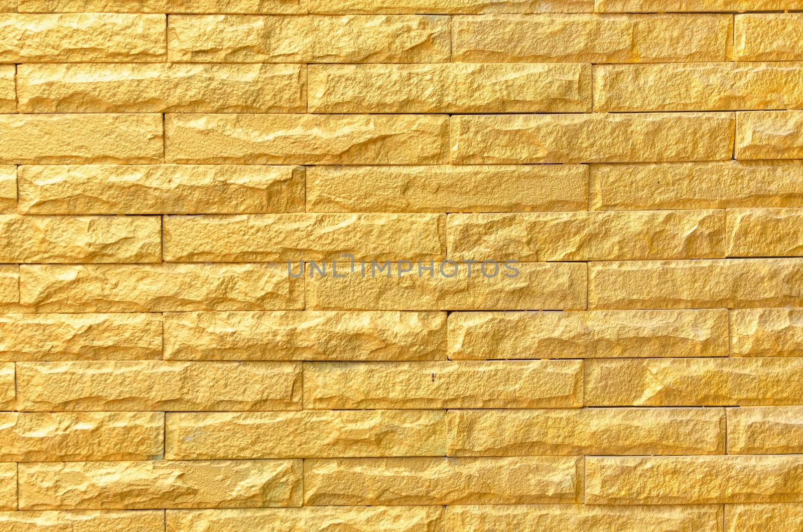 golden brick wall background pattern texture by nopparats