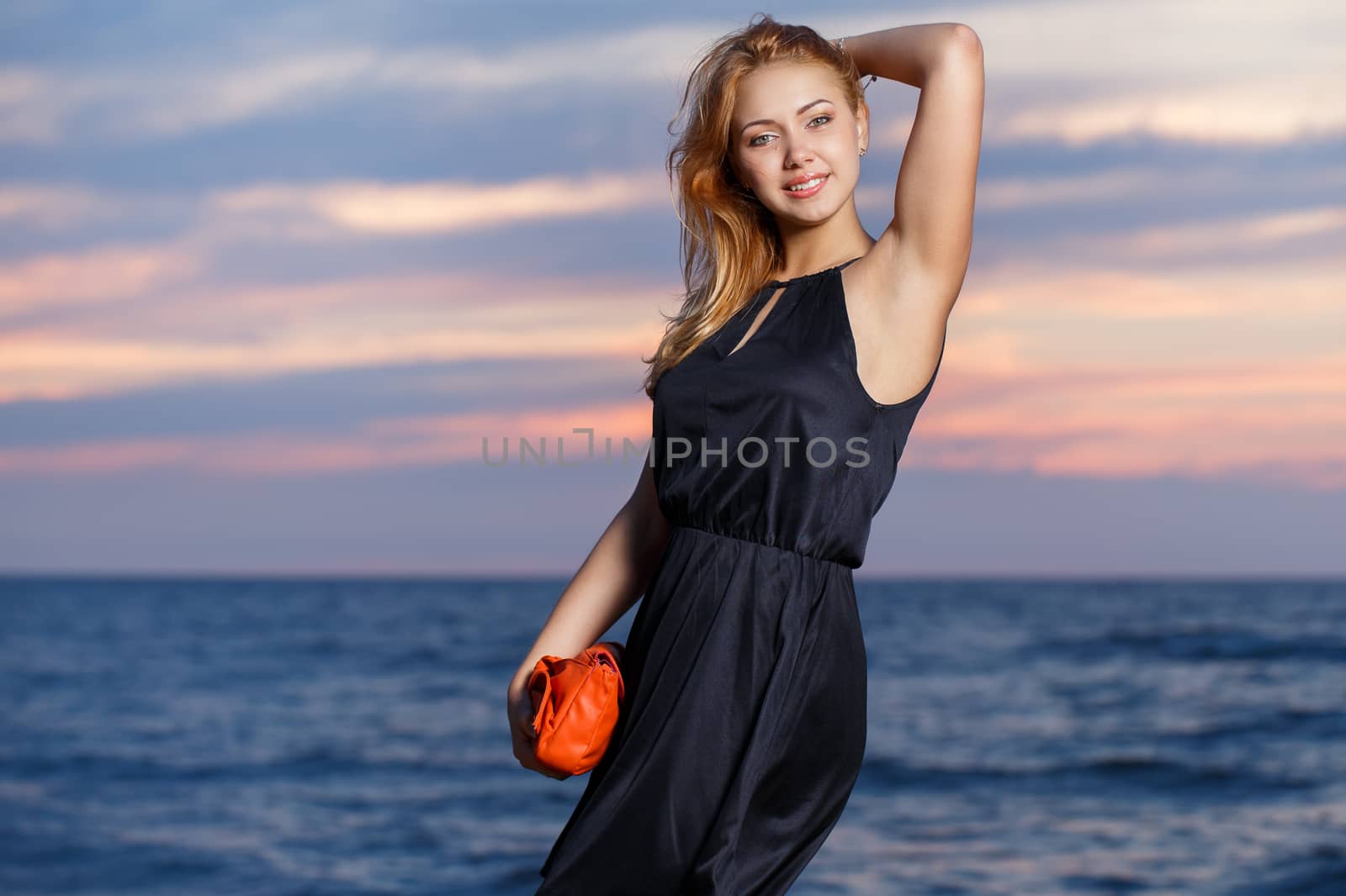 Summer, sea. Cute girl on the beach