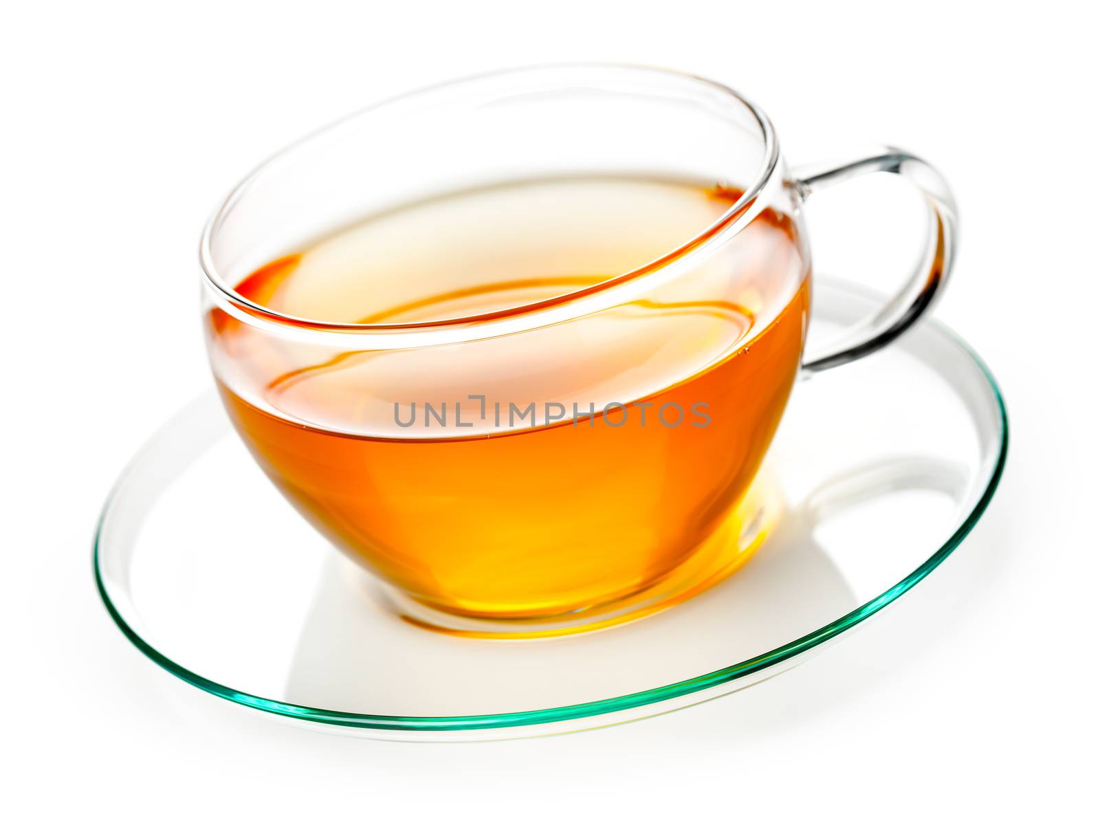 Tea in glass cup on white background 