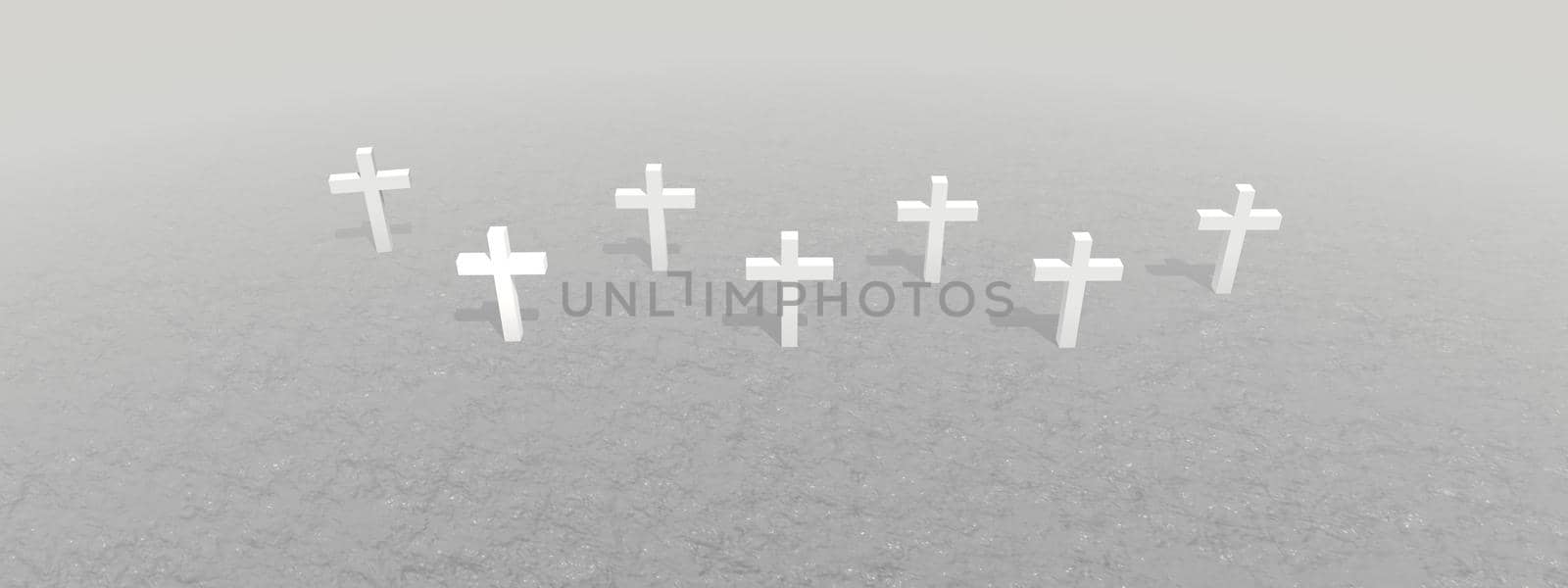 Seven white crosses planted in the ground by snuset