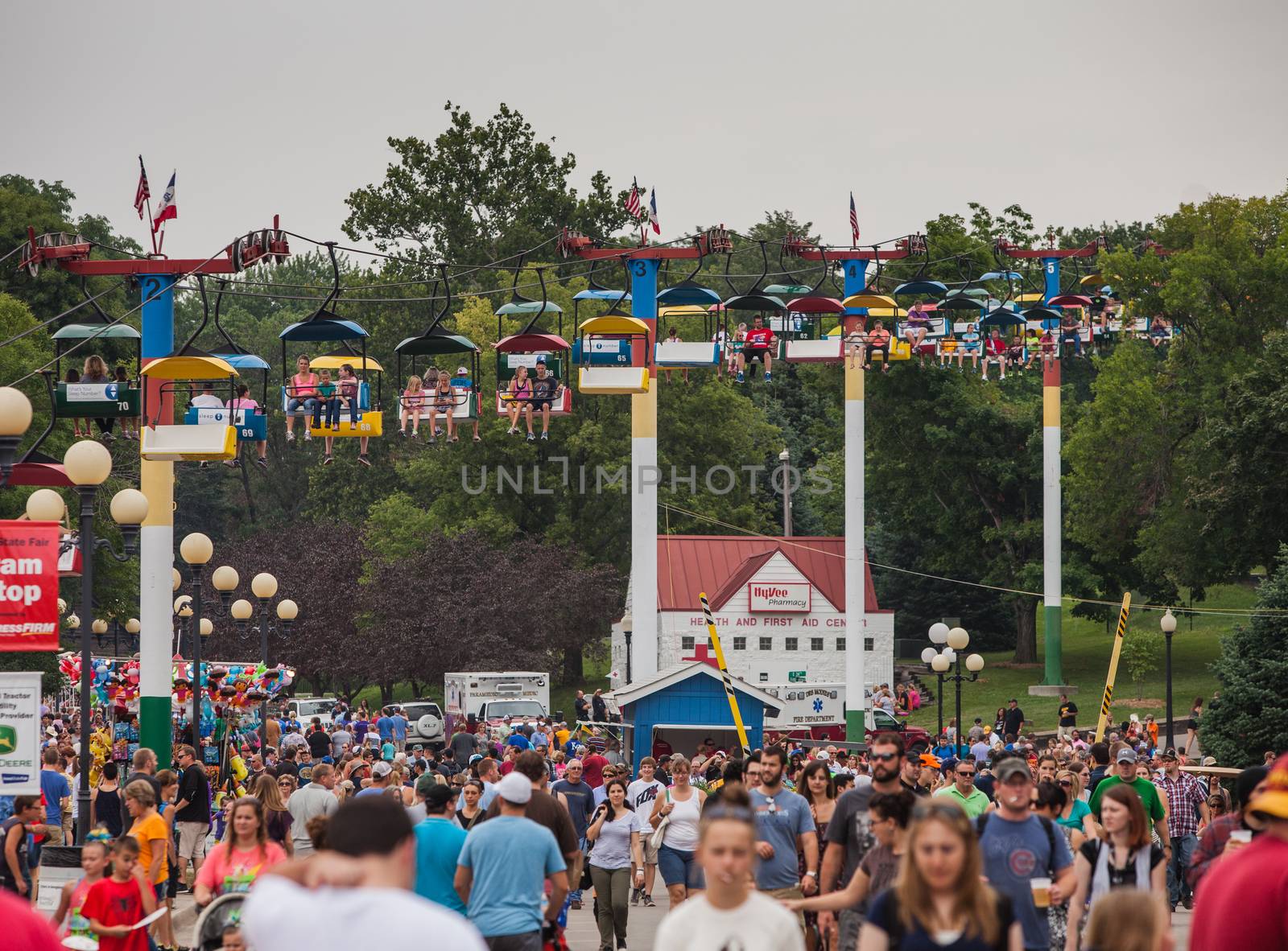 DES MOINES, IA /USA - AUGUST 10: Attendees at the Iowa State Fair. Thousands of people filling the midway at the Iowa State Fair on August 10, 2014 in Des Moines, Iowa, USA.