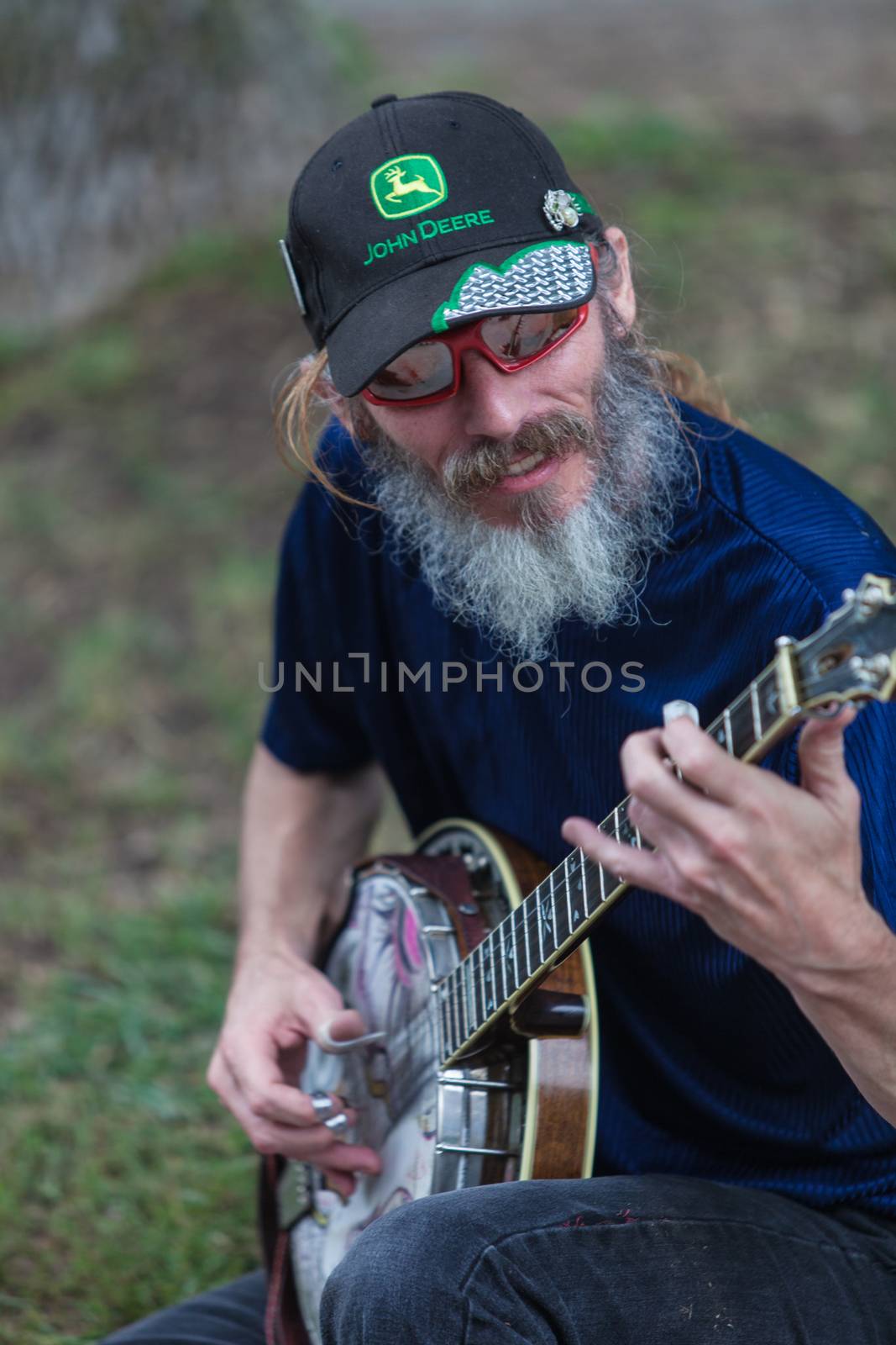 DES MOINES, IA /USA - AUGUST 10: Unidentified banjo player at the Iowa State Fair on August 10, 2014 in Des Moines, Iowa, USA.