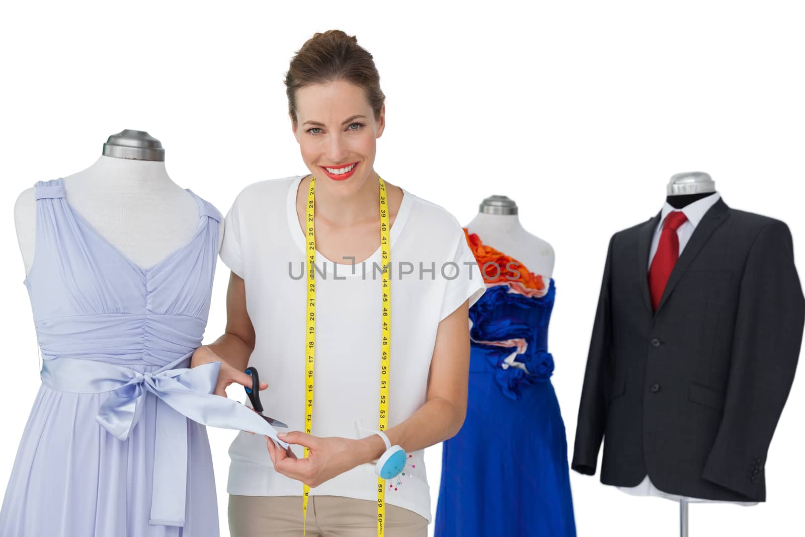 Portrait of a female fashion designer and mannequin isolated on white background