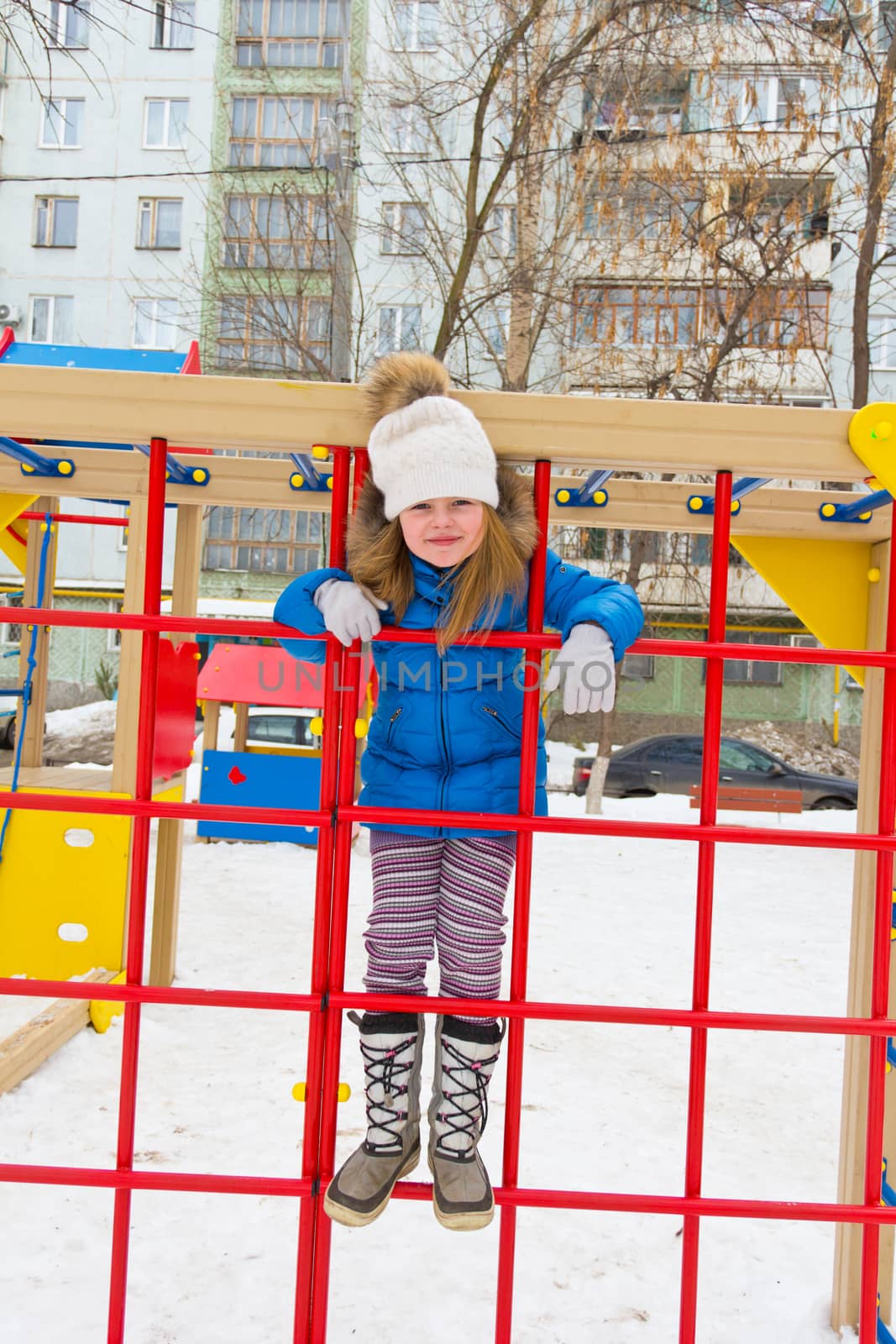 Photo of playing cute girl in winter