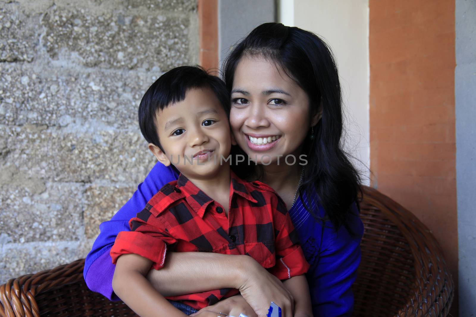 Young happy asian mother and her son