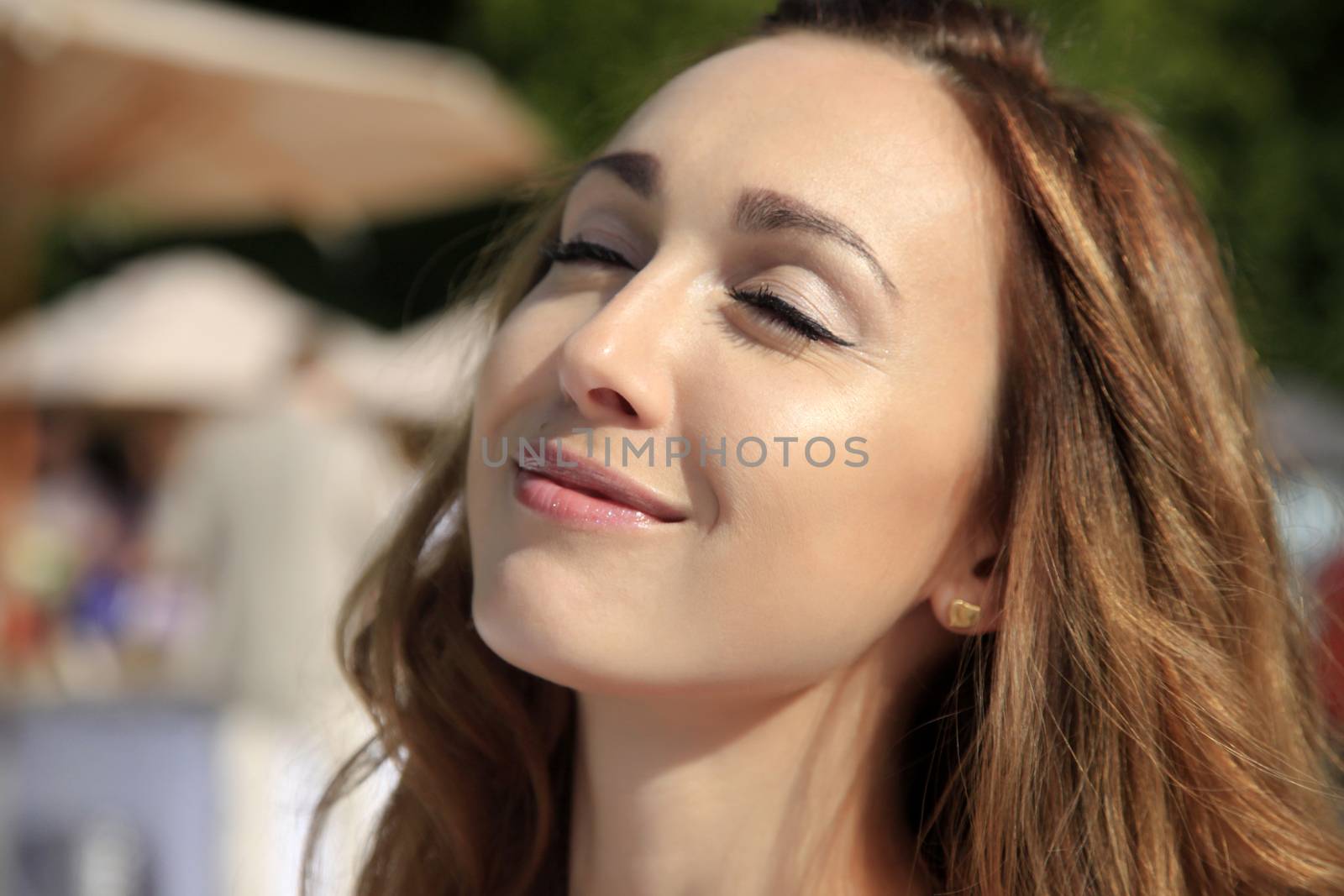 beautiful young woman enjoying the sun
