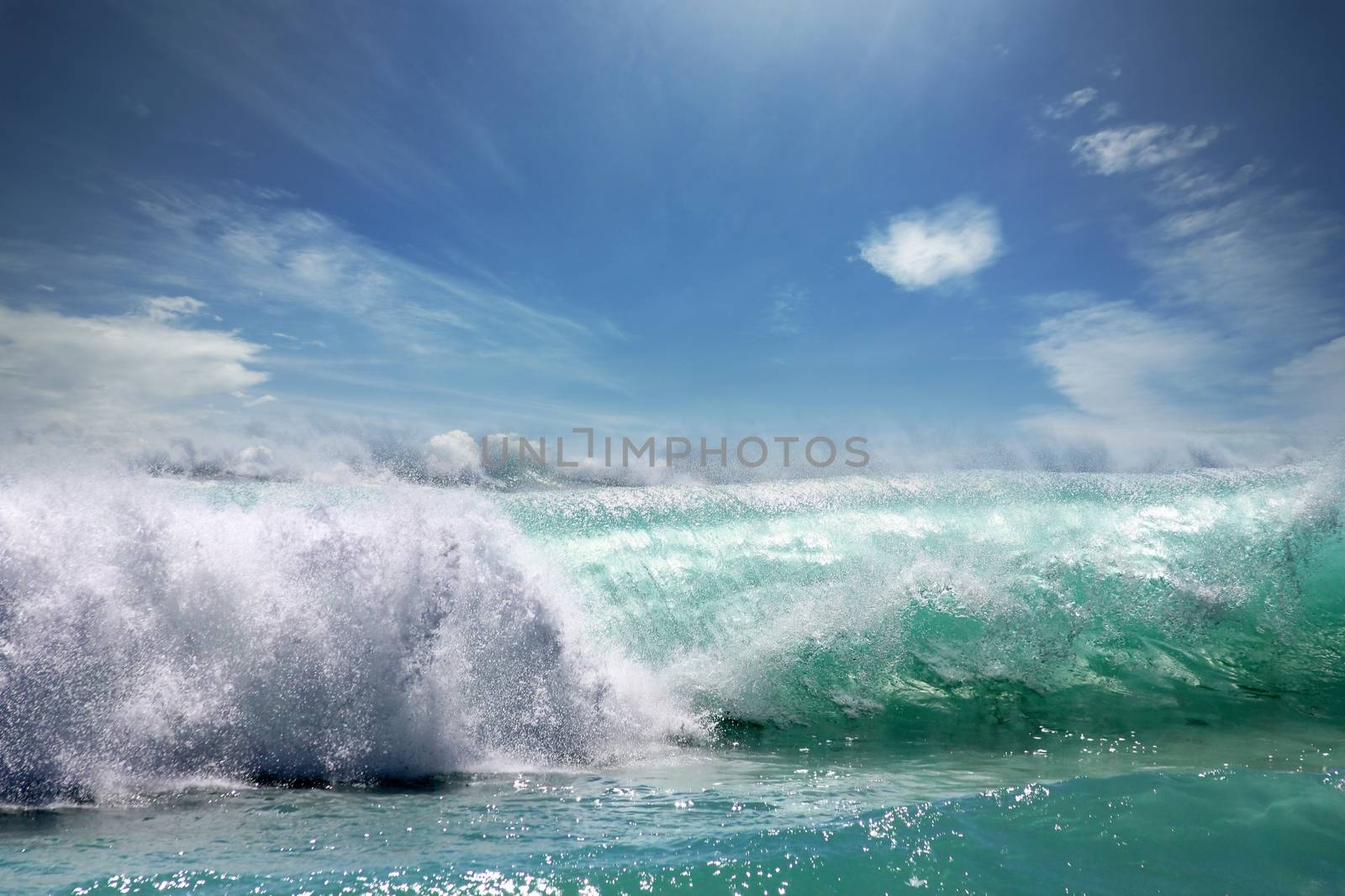 Big ocean wave breaking the shore