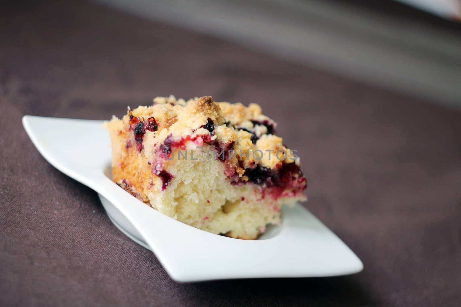 Traditional yeast cake with crumble topping and black currant