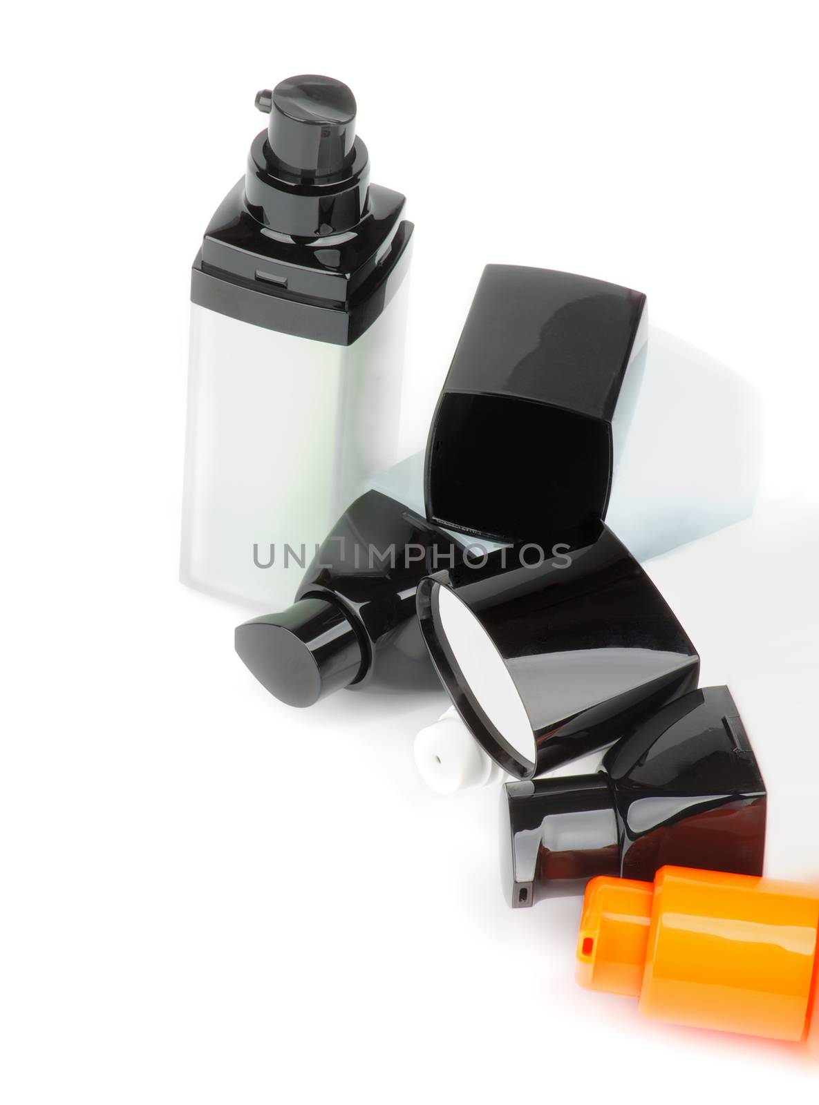 Various Facial Cosmetics Containers with Cleanser, Moisturizer and Care Creams isolated on white background