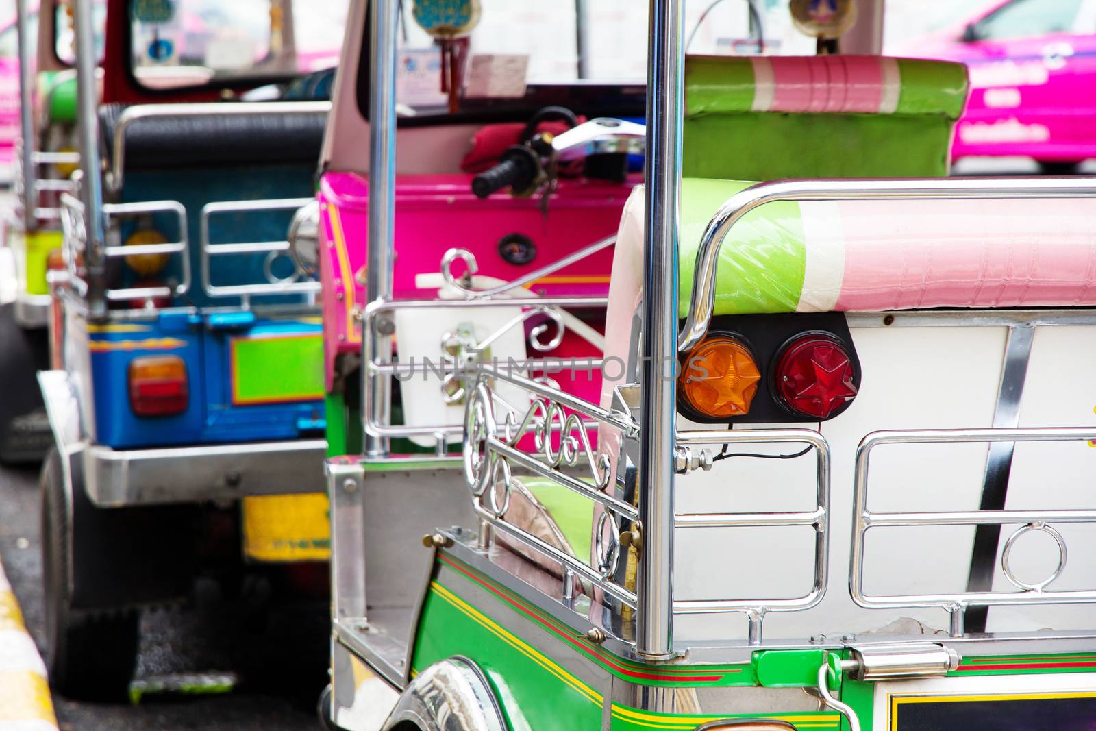 Tuk tuks taxi lined up in Bangkok, Thailand