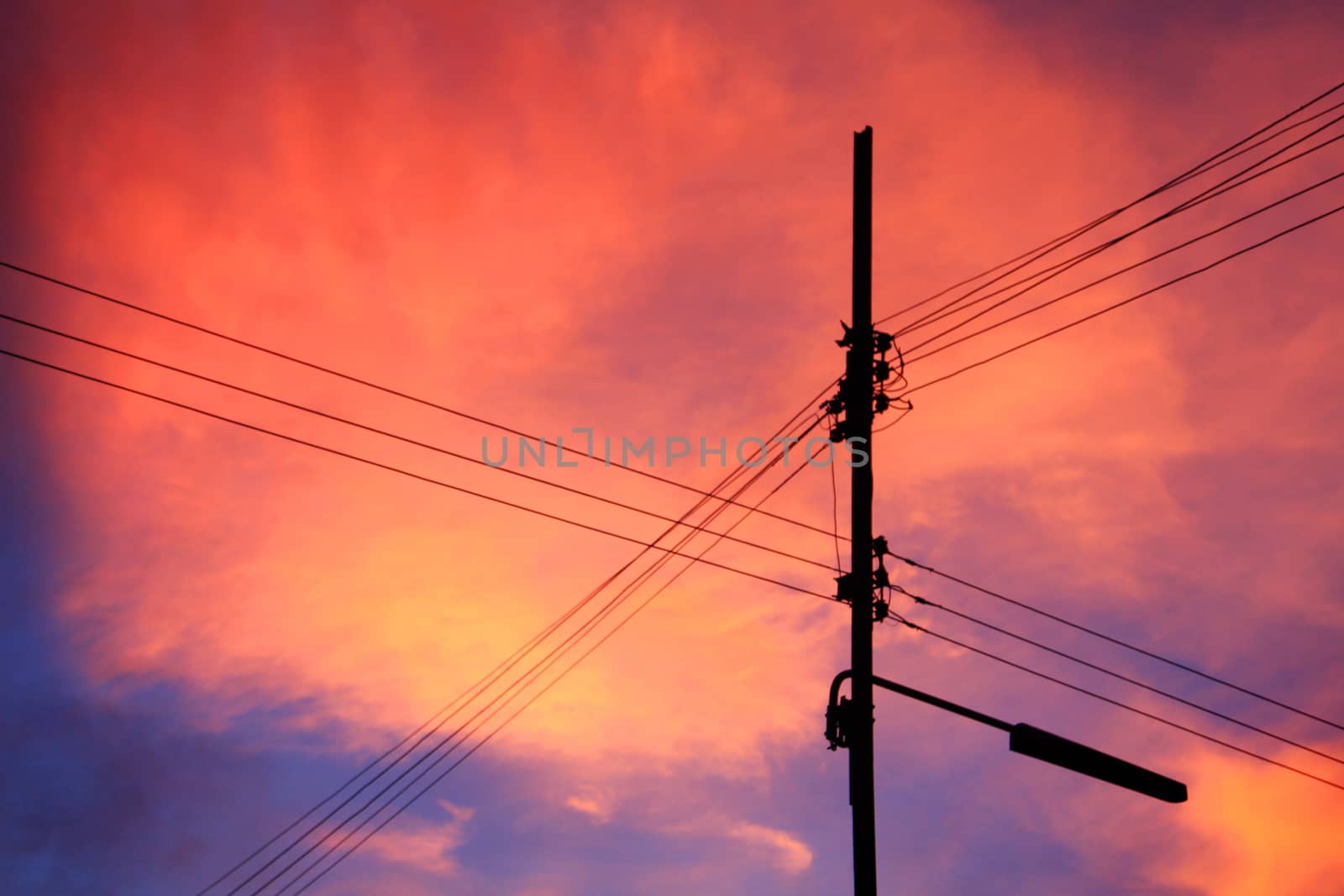 Sunset in Thailand and electricity pole
