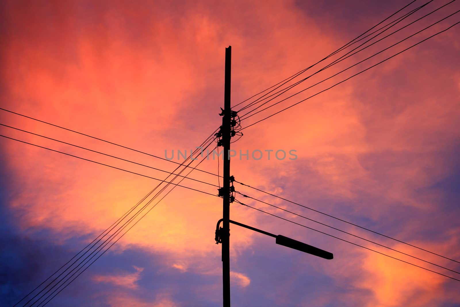 Sunset in Thailand and electricity pole by foto76