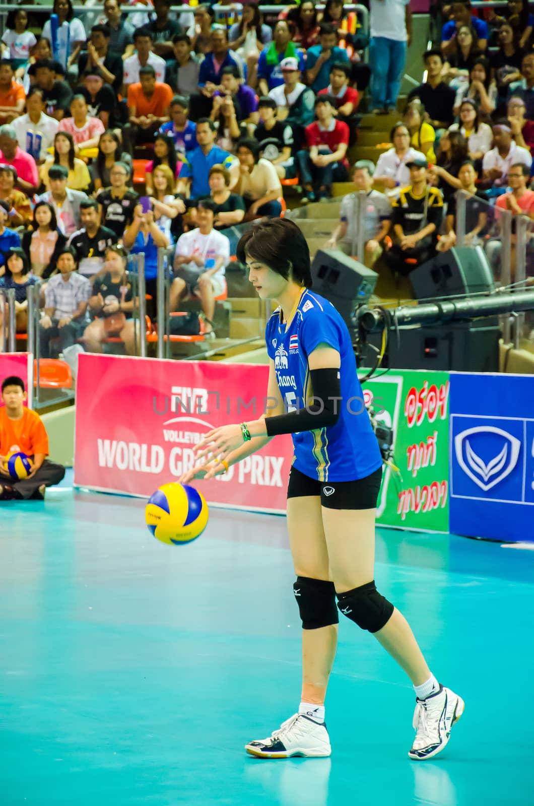 BANGKOK - AUGUST 16: Pleumjit Thinkaow of Thailand Volleyball Team in action during The Volleyball World Grand Prix 2014 at Indoor Stadium Huamark on August 16, 2014 in Bangkok, Thailand.