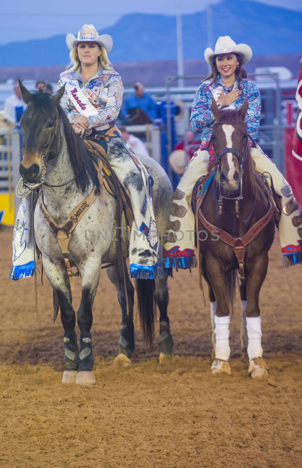 LOGANDALE , NEVADA - APRIL 10 : Cowgirls Participates in the opening ceremony of the Clark County Rodeo held in Logandale Nevada , USA on April 10 , 2014