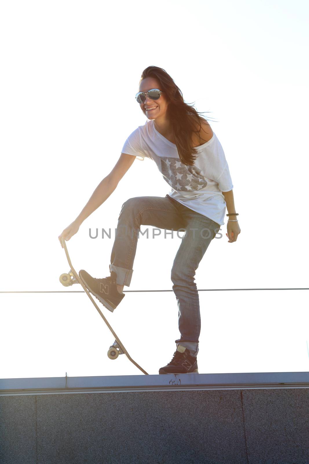 The girl on a skateboard by robert_przybysz