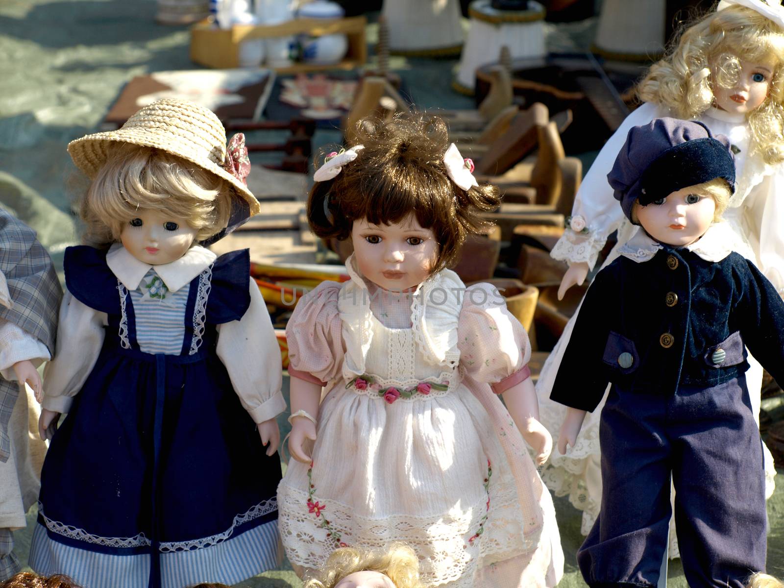 Old dolls for sale at antiques fair   