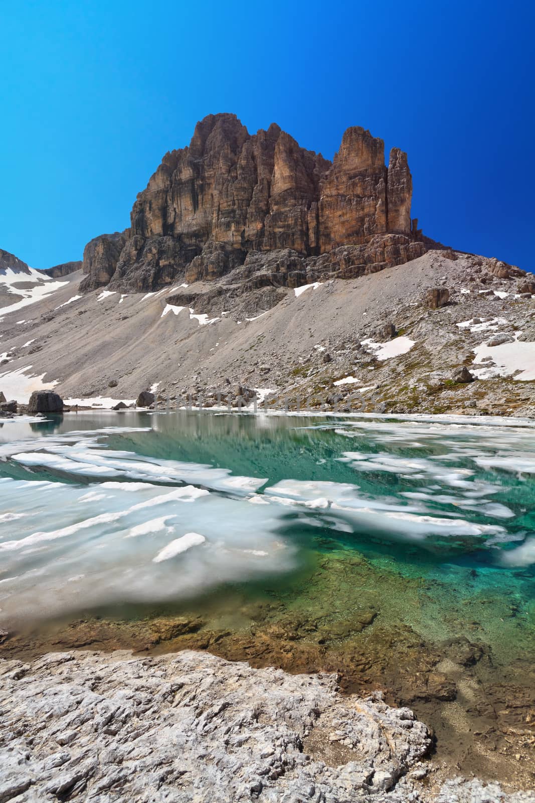 summer view of  Pisciadu lake and Sas de Lech peak in Sella mountain, sudtirol, Italy