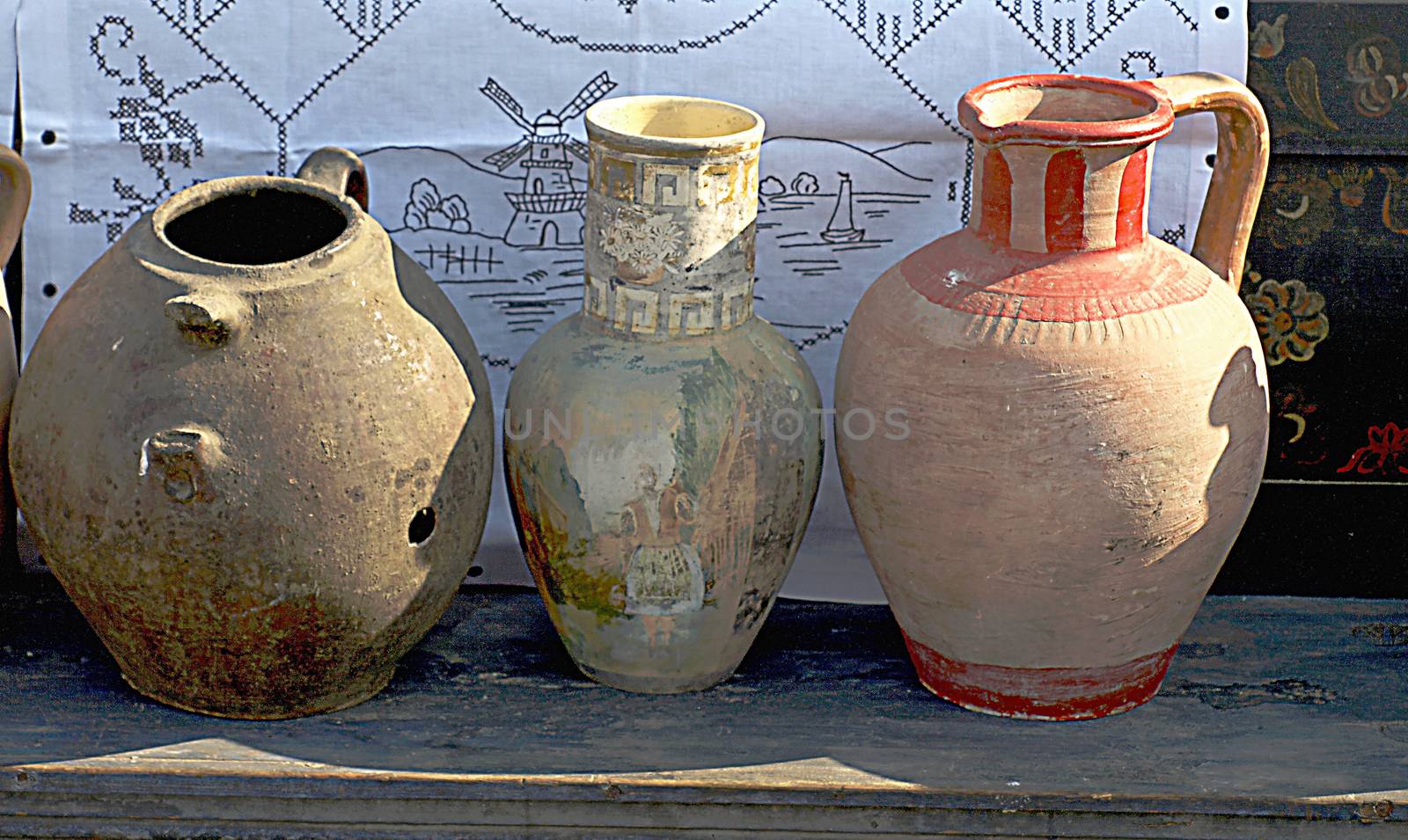 Old jugs for sale at antiques fair  