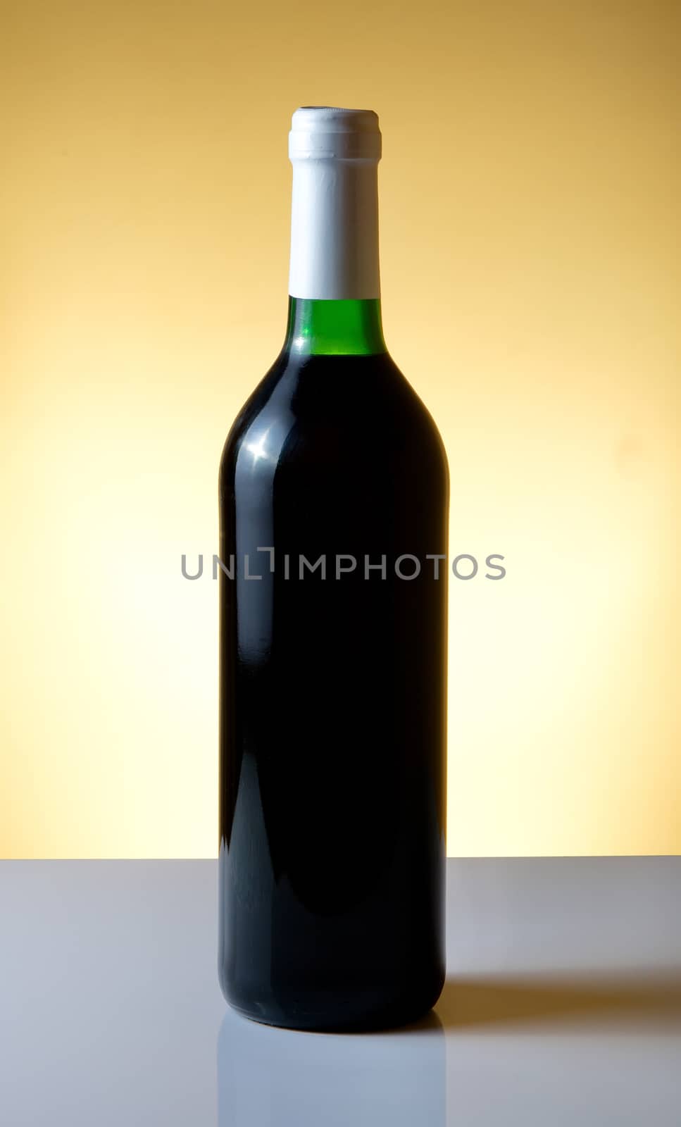 Vine bottle on orange background
