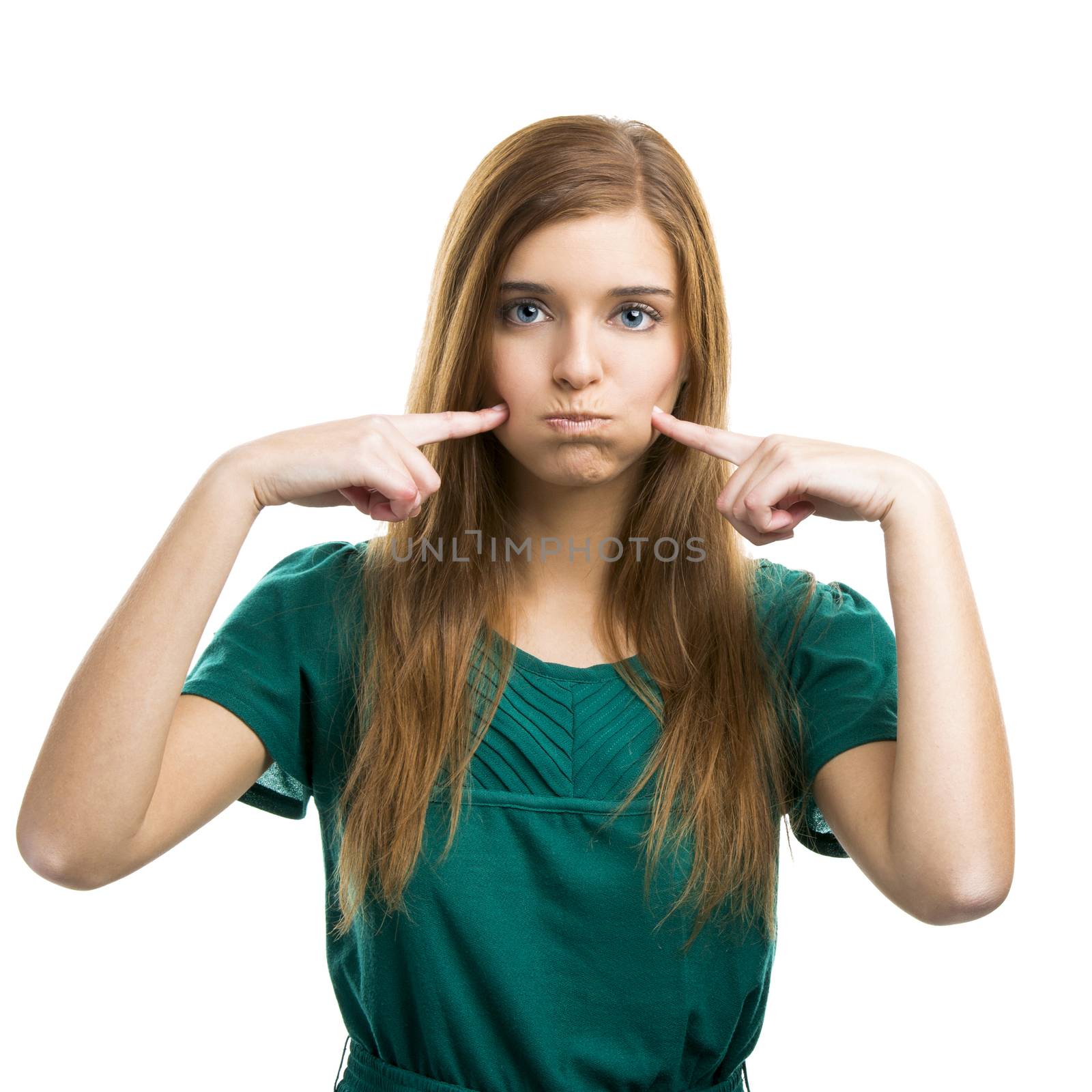 Portrait of a beautiful girl making pout isolated on white background