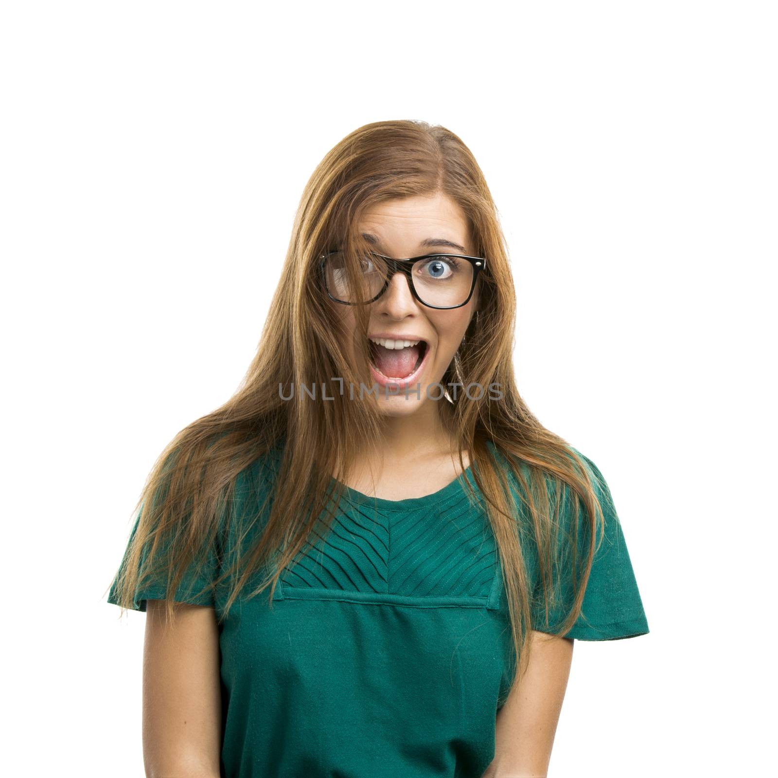 Portrait of a beautiful girl with a surprised expression isolated on white background