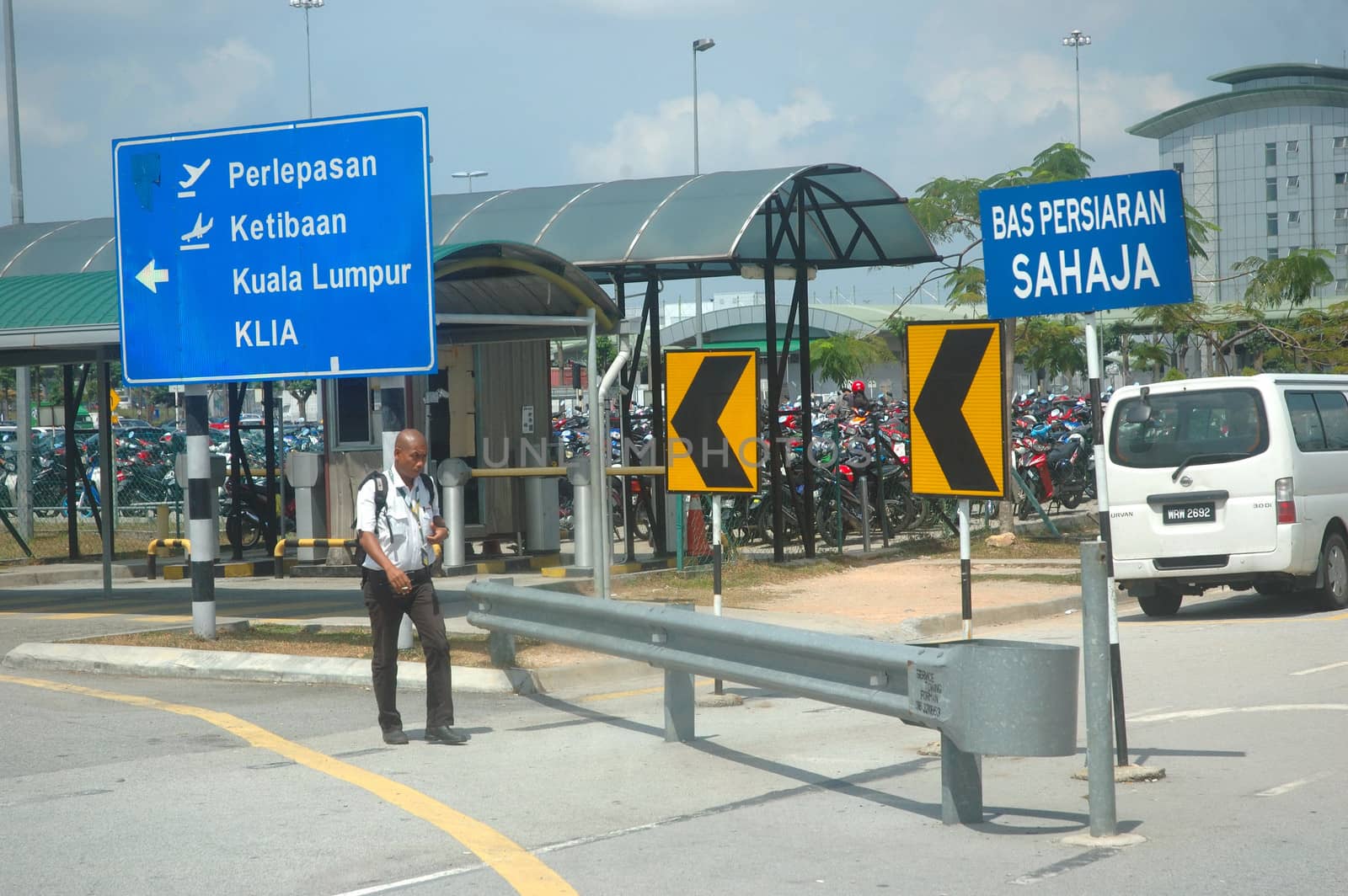 KLCCT, Malaysia - June 7, 2013: Road traffic at Kuala Lumpur Low Cost Carrier Terminal (KLCCT), Malaysia.