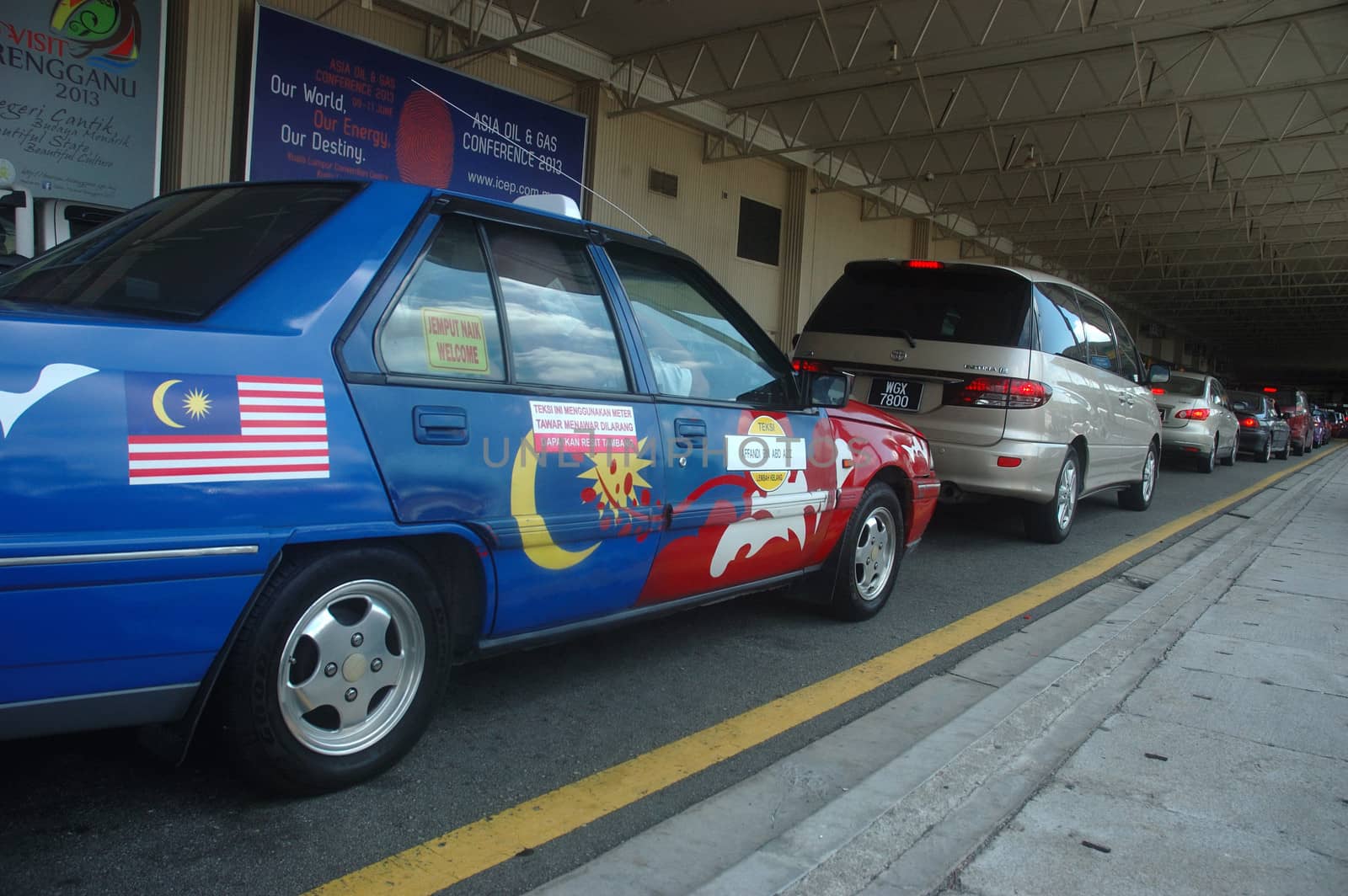 KLCCT, Malaysia - June 7, 2013: Blue colored taxi that operated in Kuala Lumpur Low Cost Carrier Terminal (KLCCT), Malaysia.