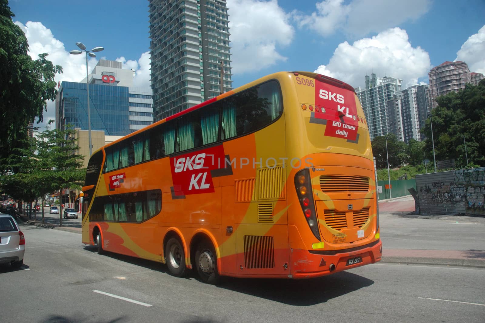 Kuala Lumpur, Malaysia - June 8, 2013: Road traffic at Kuala Lumpur city, Malaysia.