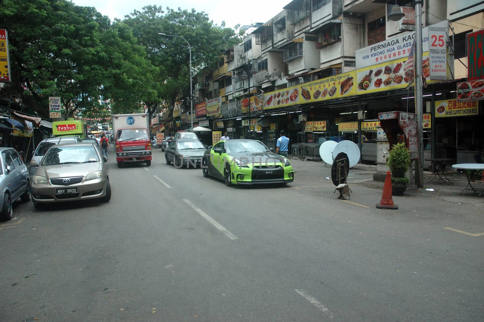 Kuala Lumpur, Malaysia - June 8, 2013: Road traffic at Kuala Lumpur city, Malaysia.