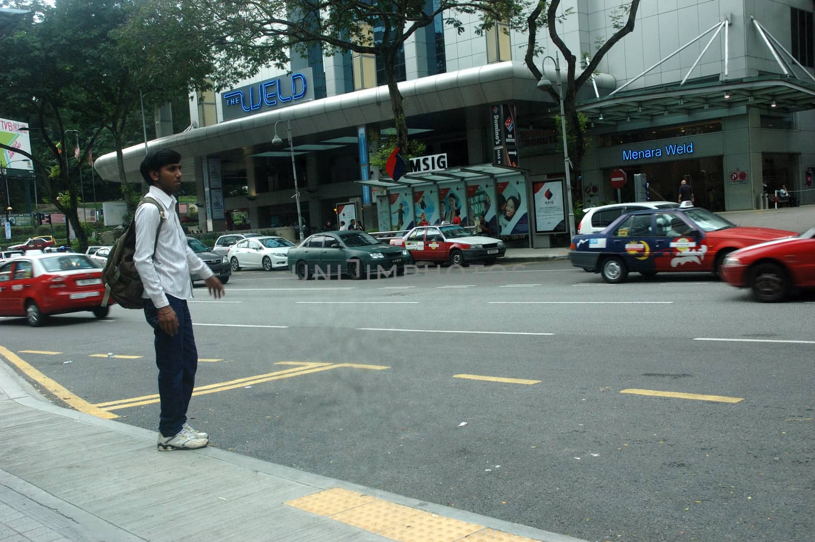 Kuala Lumpur, Malaysia - June 8, 2013: Road traffic at Kuala Lumpur city, Malaysia.