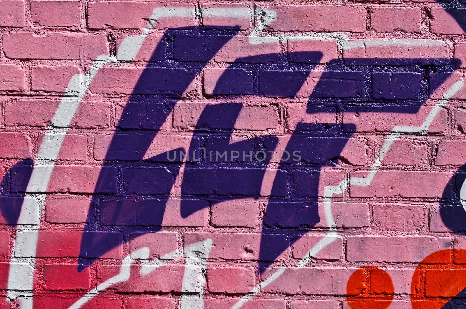 abstract graffiti on brick background by NeydtStock
