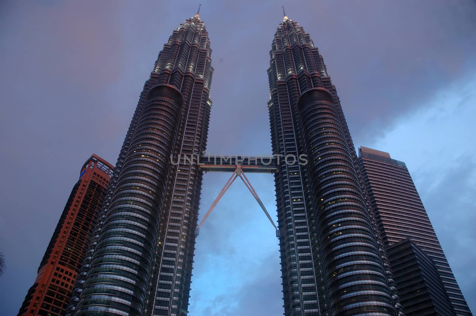 Kuala Lumpur, Malaysia - June 8, 2013: The Petronas Towers, also known as the Petronas Twin Towers are twin skyscrapers in Kuala Lumpur, Malaysia.