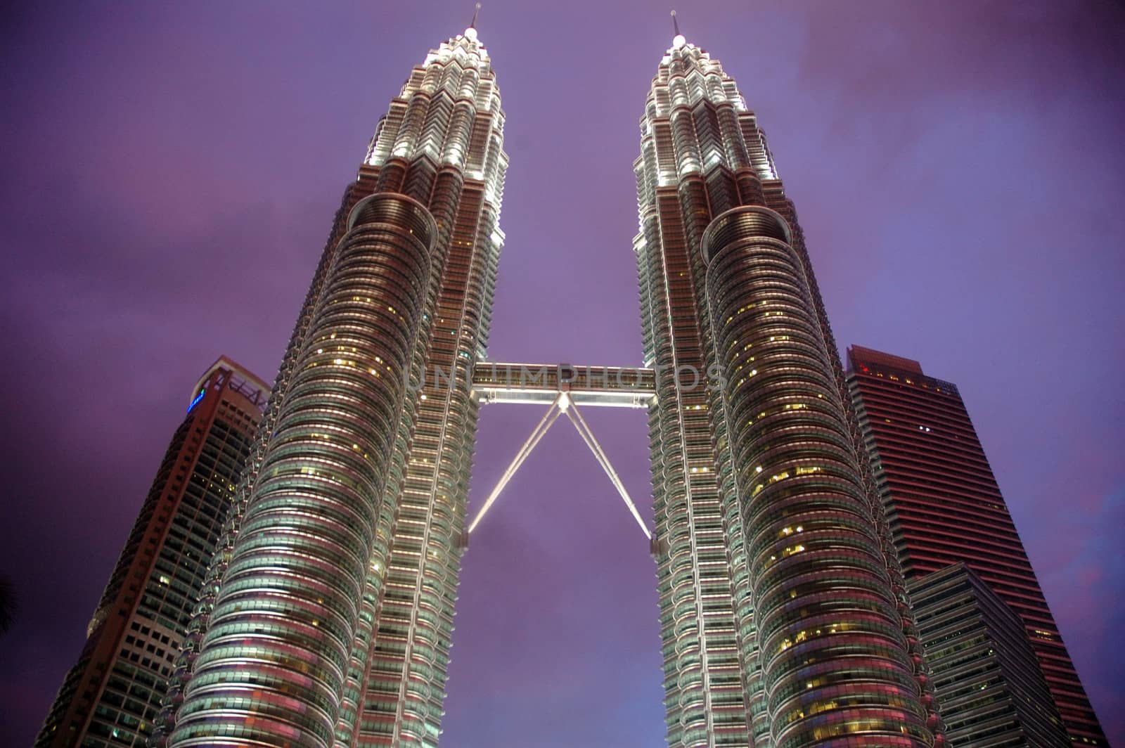 Kuala Lumpur, Malaysia - June 8, 2013: The Petronas Towers, also known as the Petronas Twin Towers are twin skyscrapers in Kuala Lumpur, Malaysia.