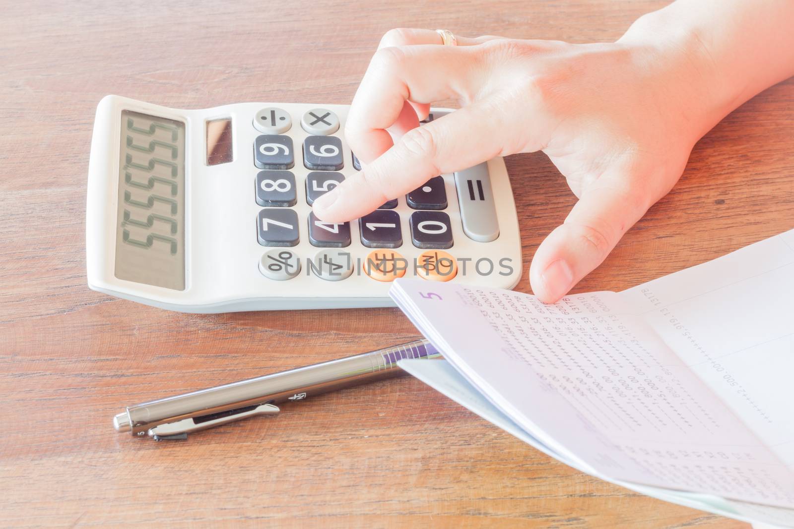 Businesswoman calculated account balance, stock photo