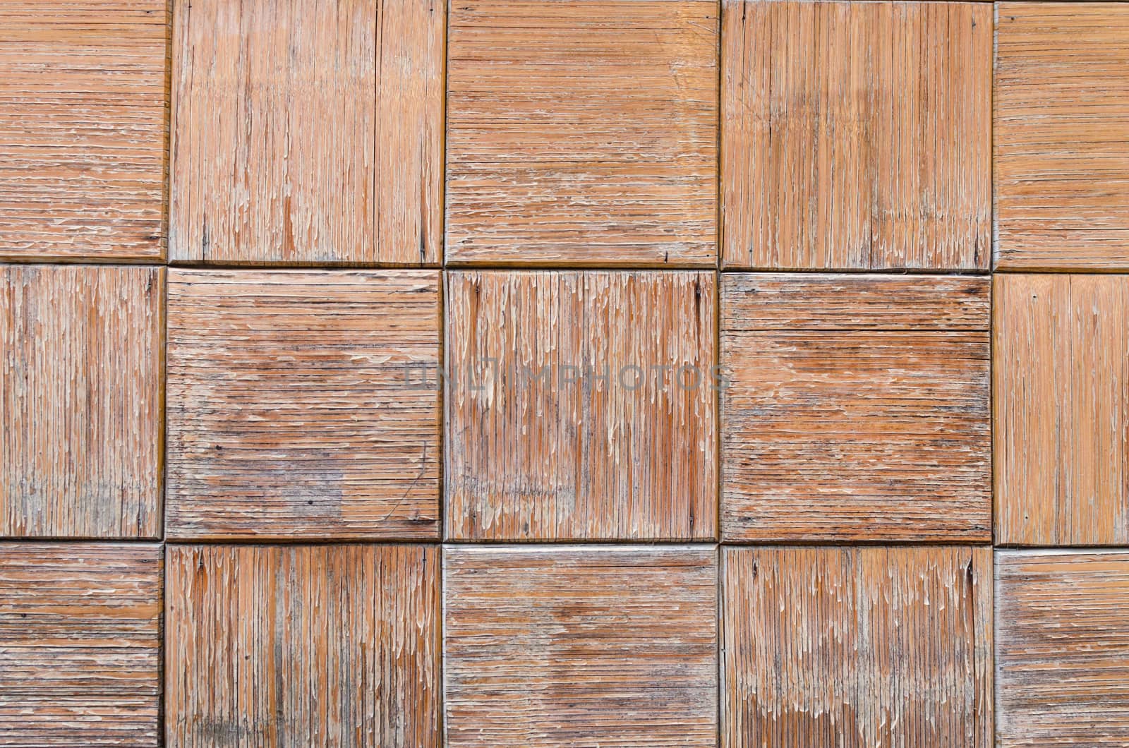 Close up of old gray wooden fence panels by nopparats