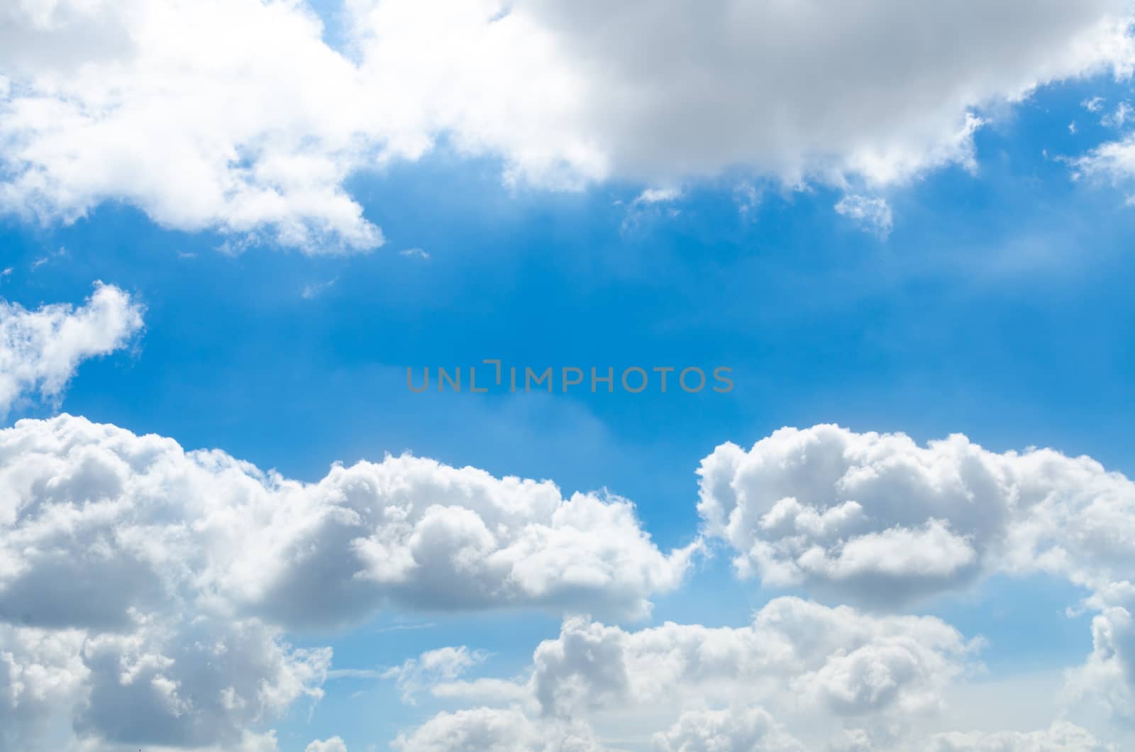 blue sky with cloud closeup by nopparats