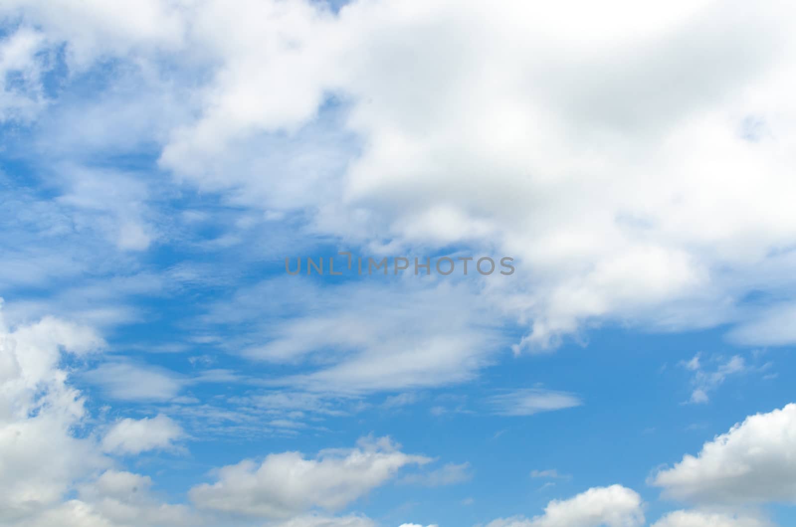blue sky with cloud closeup by nopparats