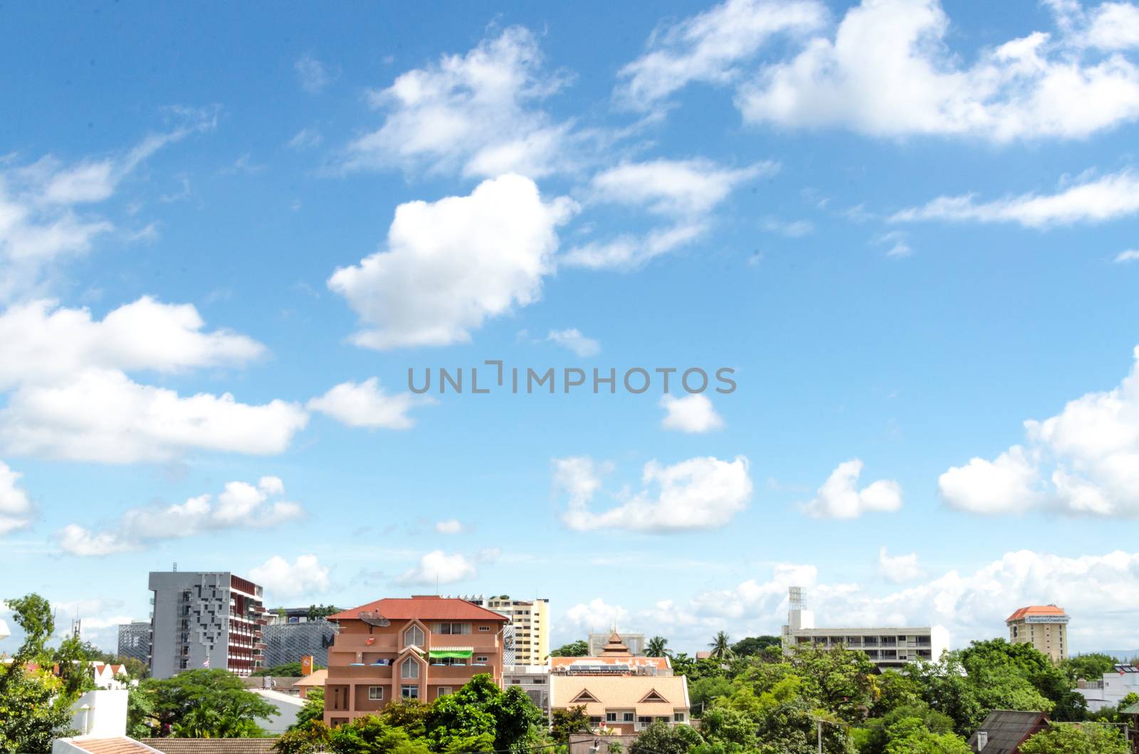 landscape or cityscape green city and blue sky with cloud closeup