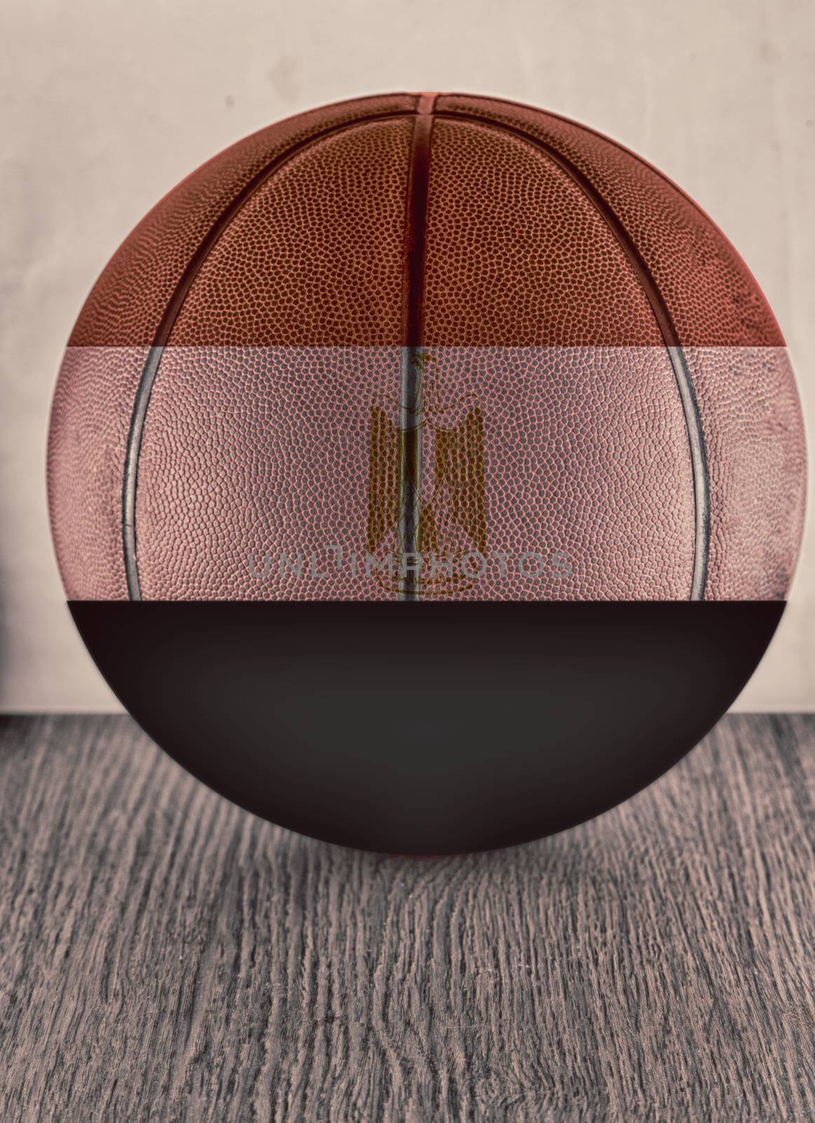 Basketball with flag of Egypt, over wooden surface, hdr image