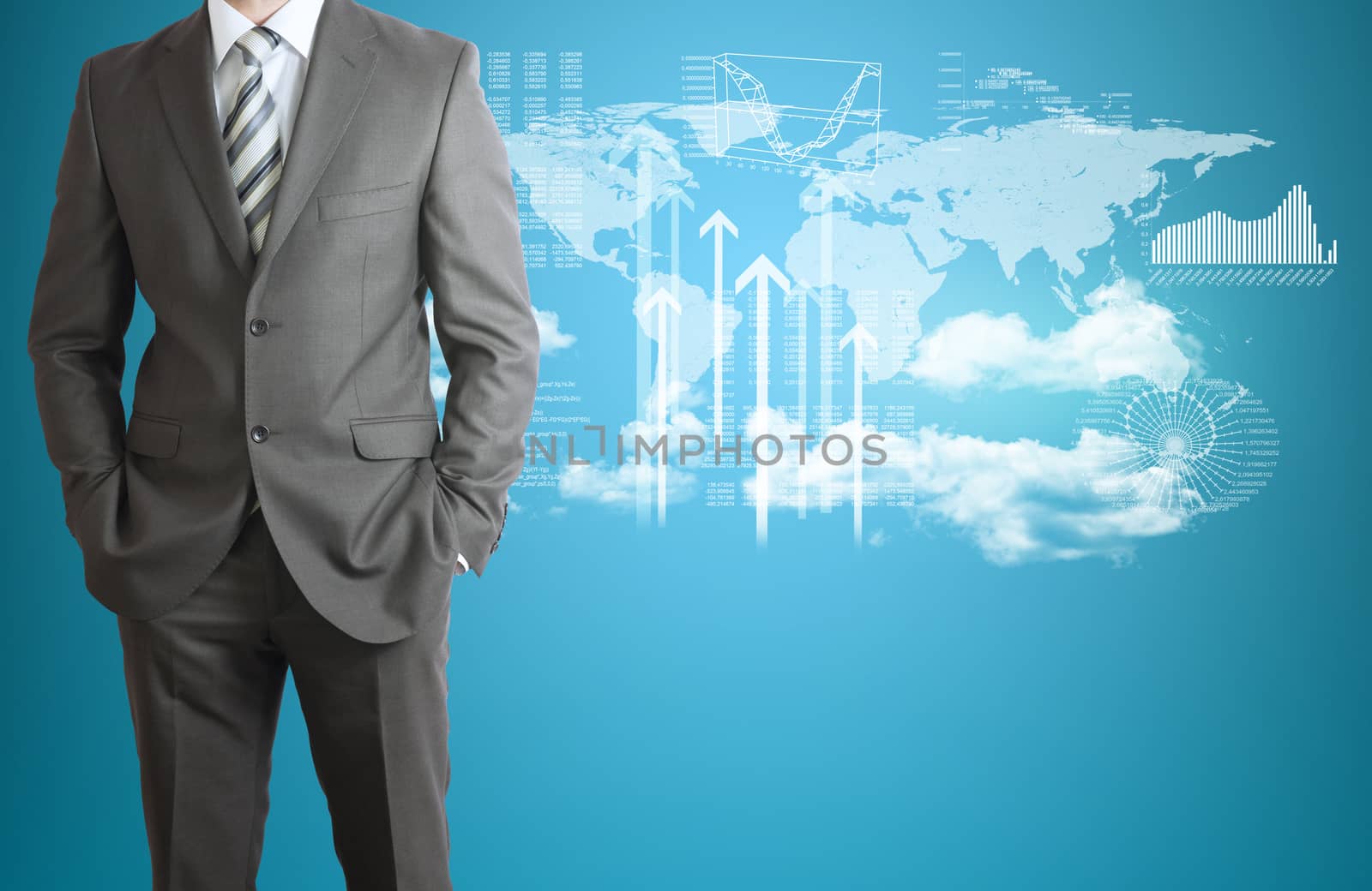 Businessman in suit. World map, clouds, and graphs as backdrop