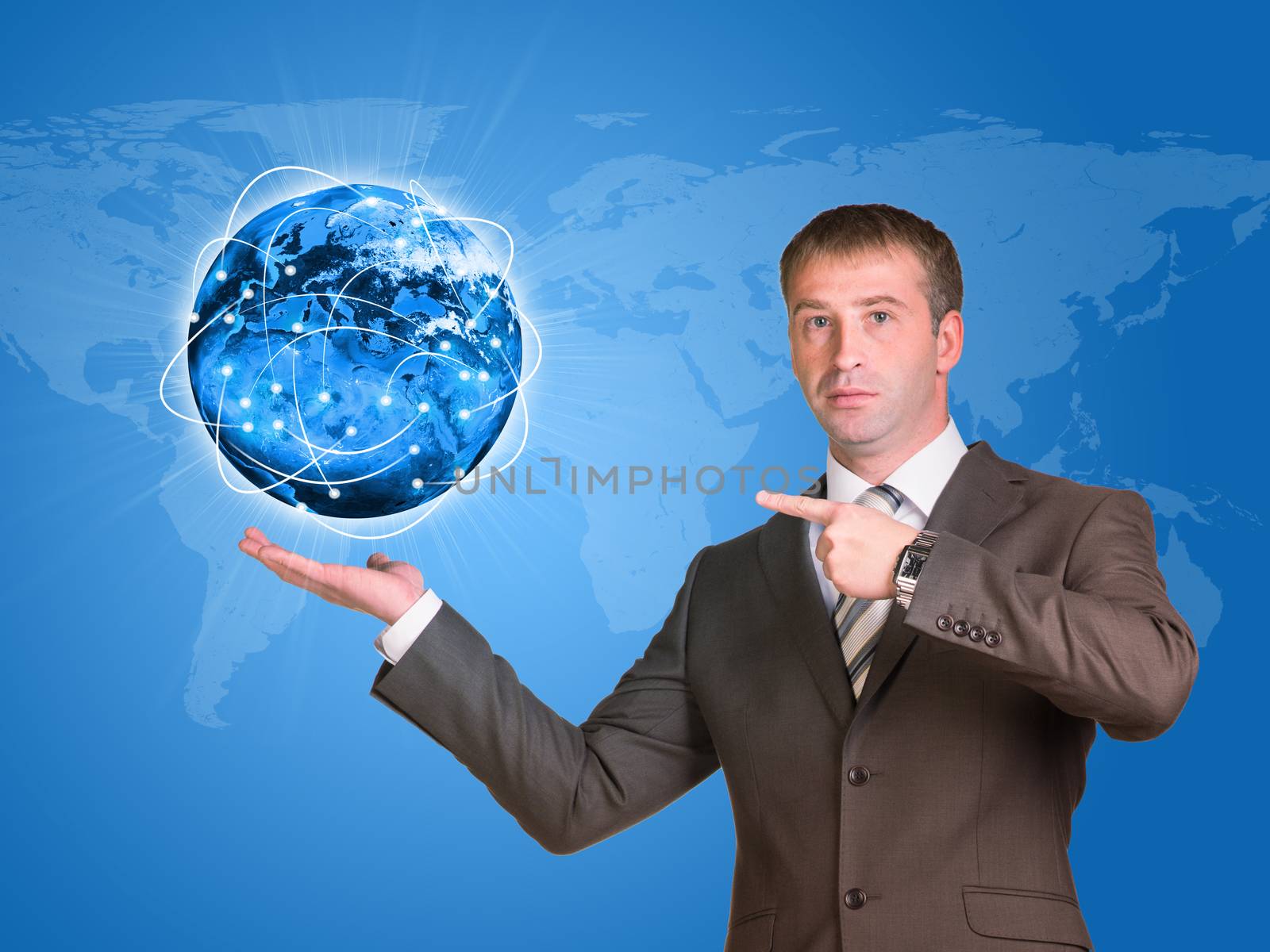 Businessman in a suit hold Earth with lines by cherezoff