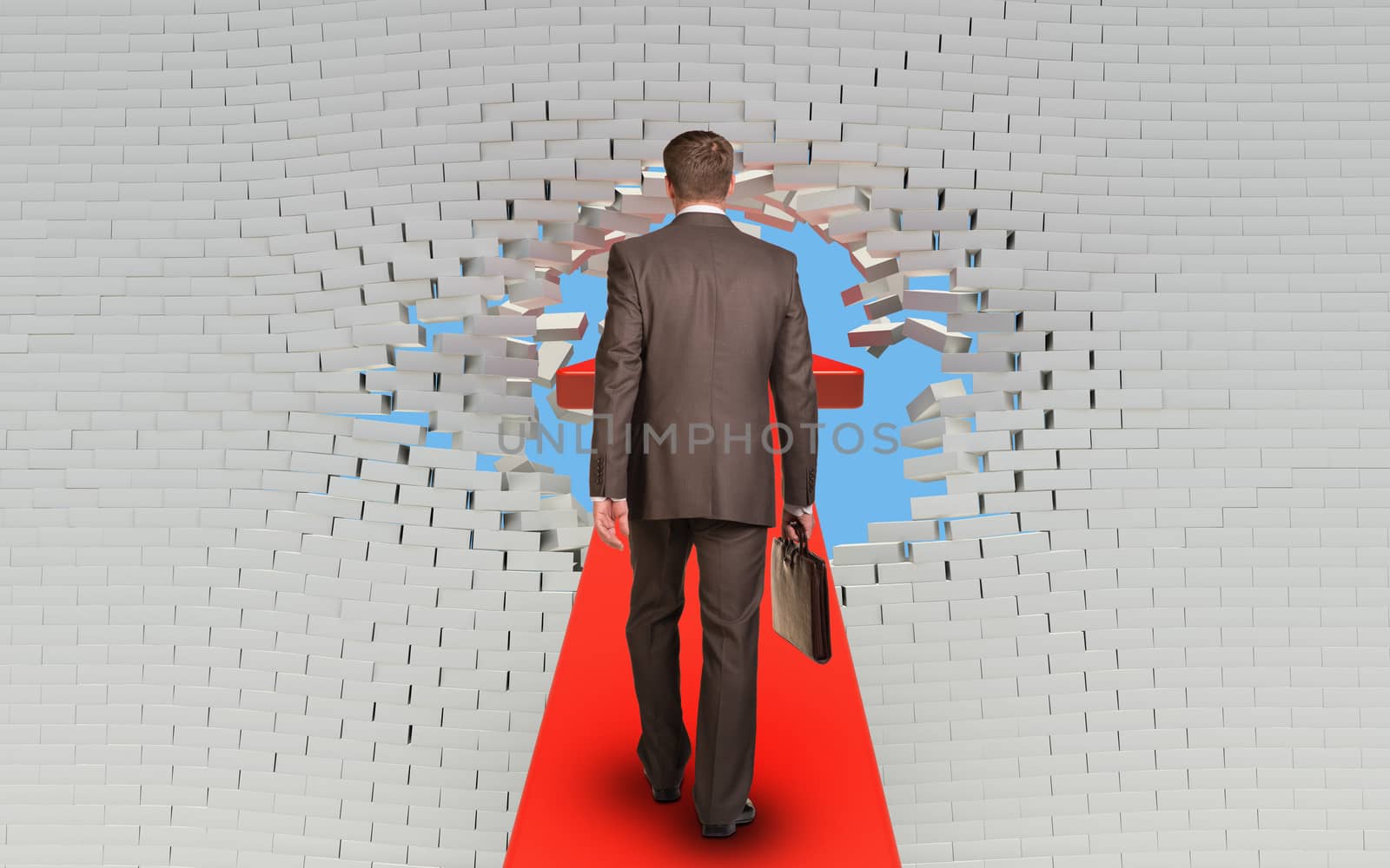 Businessman with briefcase walking on arrow pierced brick wall