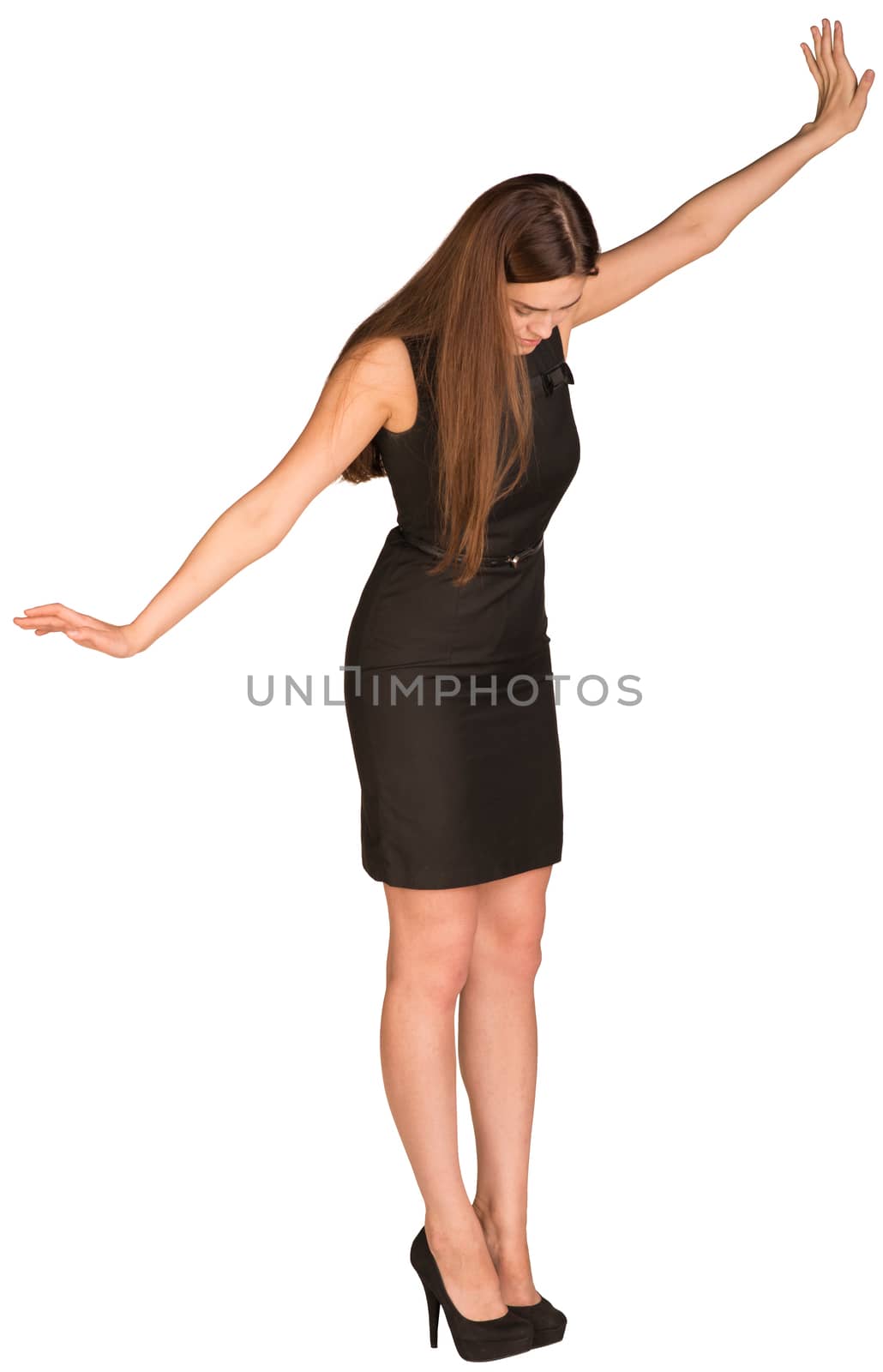 Businesswoman in dress looking down fearfully. Isolated on the white background