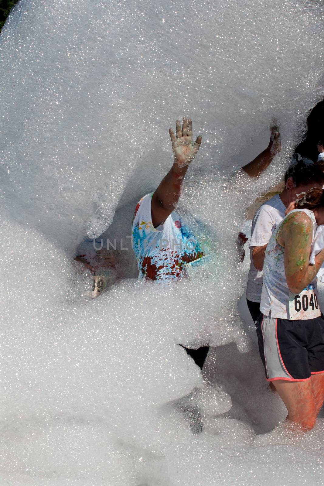 Woman Is Covered In Soap Suds At Bubble Palooza Event by BluIz60