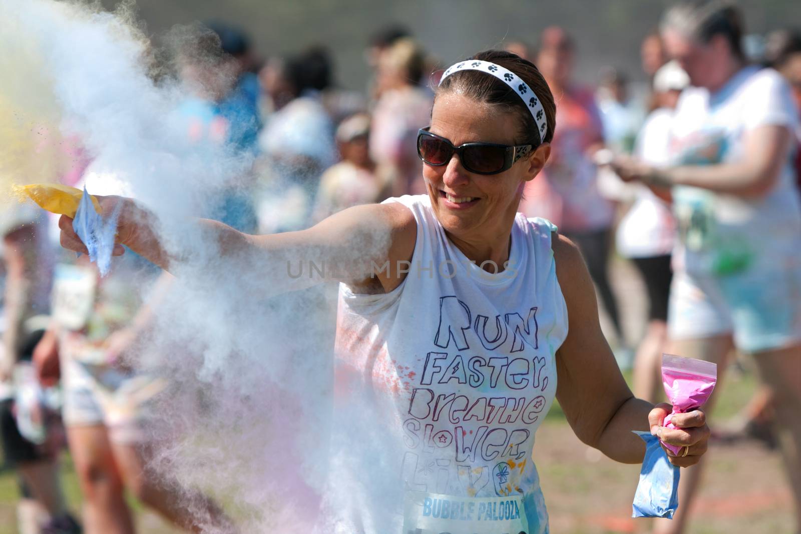 Woman Throws Colored Corn Starch At Bubble Palooza Event by BluIz60